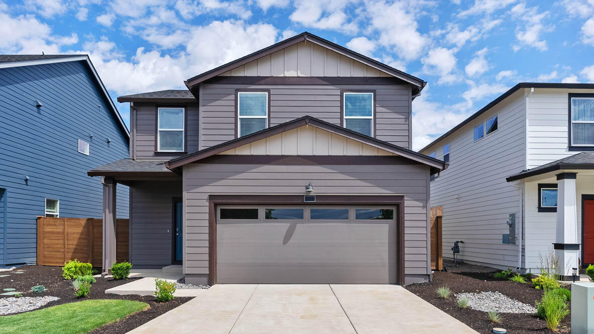 Move in ready home in Bend!! Discover Monrovia in Bend, located adjacent to Sun Meadow Park and Jewell elementary school! This thoughtfully designed community offers convenient access to shopping, dining, and schools, along with outdoor activities that make Bend so desirable. The Porter plan features a bedroom and full bathroom on the main floor and four bedrooms and 2 full bathrooms up. The great room features a modern fireplace with color-changing ability and a painted accent wall. The gourmet kitchen boasts shaker cabinets, quartz countertops, and stainless-steel appliances with a gas range. The primary suite offers a relaxing retreat with a spacious walk-in closet, double vanity, and generous shower. The hall bath upstairs features a double vanity and separate toilet/bath & shower room. Call for details. Open Wednesday - Sunday 10am - 5:30pm. Photos are representative of the plan; features and specs may var