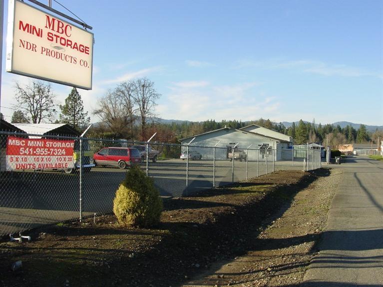 Great Multi-use Facility on 3 separate tax lots totaling 1.29 acres. Lot 1 has a 5450 S/F Industrial Bldg. with Manufacturing/warehouse office space. Lot 2 has 68 self storage units and approvals to add 18 more. Lot 3 has 3 metal canopy carports with 5x10 storage units. This is a 50x100 lot that has the best visibility from the road and could be developed further. The current owner had a manufacturing business and built the self storage units for cash flow because they require very little management. The owner had a sheet metal/machine shop and all his equipment is still set up in the bldg and could be purchased with the building. He would also just sell the equipment if someone was interested, if not he will have it removed prior to close of escrow. Either as a user or an investor this property has a lot to offer. And if all that isn't enough the owner would prefer to do an owner carry with a minimum of $150,000 down.