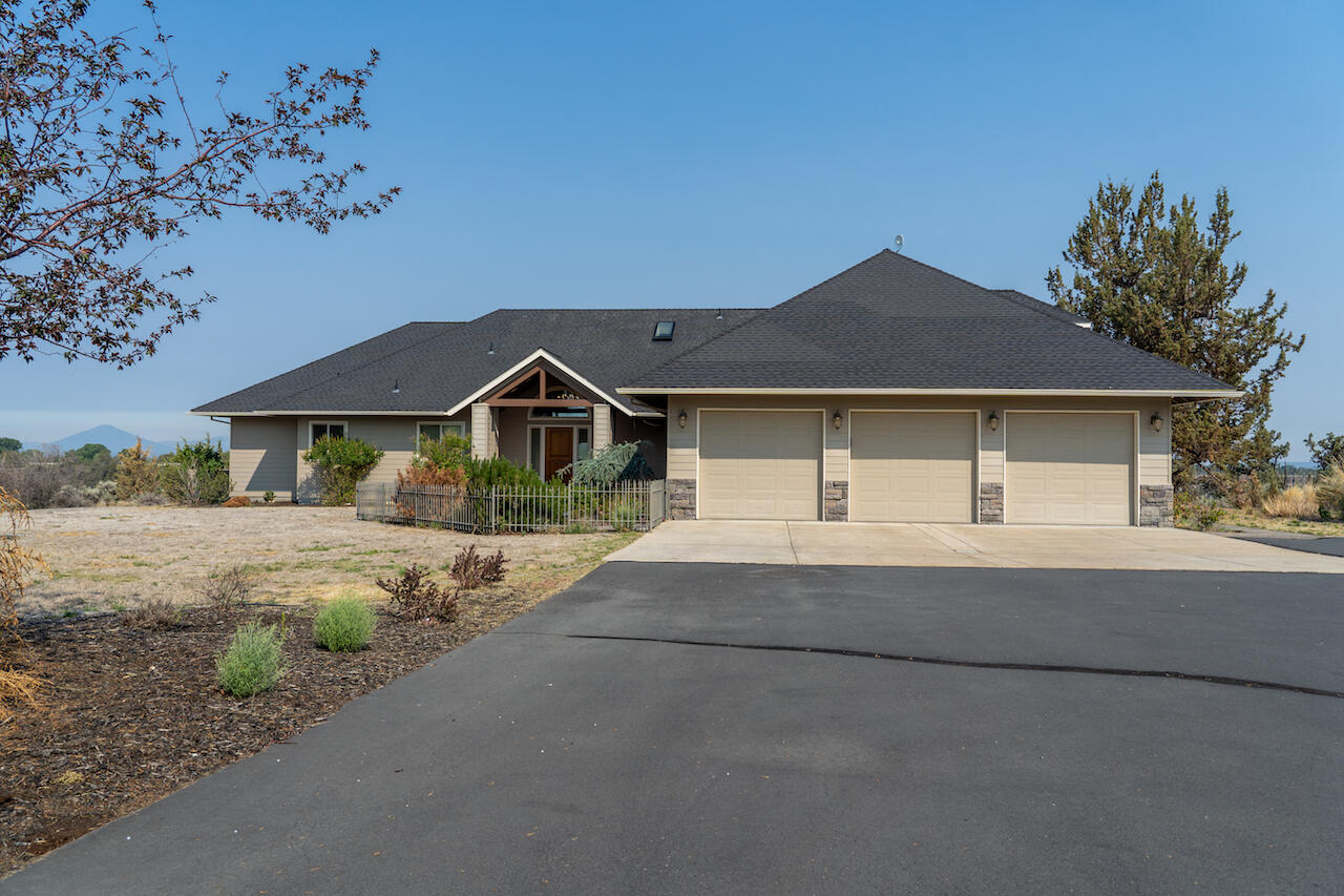 Beautiful home and setting located in the desirable Equestrian Meadows community. Property is set back on the rim and boasts views from the Three Sisters to Smith Rock. Large master on main has huge walk in closet along with access to large deck offering amazing views. Deck is perfecting for entertaining and has a great BBQ area. Home has tons of garage space, along with a large detached shop. Plenty of room for toys and parking. This home is a must see!

Link to video below.

https://iplayerhd.com/player/video/c62e3fd0-6726-4d38-b303-f7042c1c734e/share