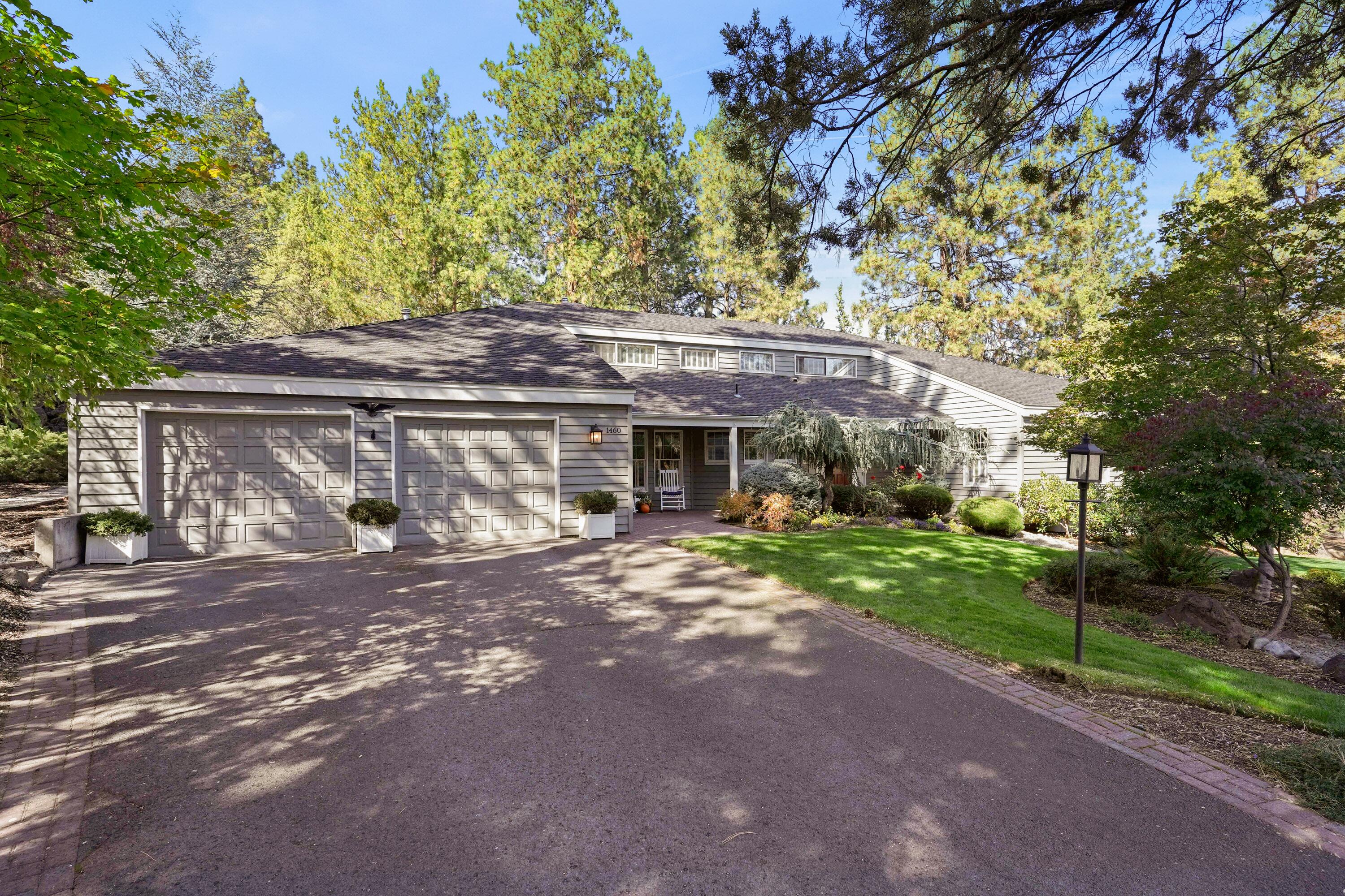 Buy a piece of Bend's history! This charming, traditional style home sits on .74 acres; nestled in a quiet yet centrally located cul-de-sac in Bend's Monarch Estates. The spacious 4 bed, 2.5 bath open floor plan welcomes families & pets, as well as remote workers with a large flex room and designated home office on the second story. The sprawling back deck offers a comfortable outdoor living space surrounded by a well-manicured backyard that abuts the SE corner of Bend's Historic Hollinshead Park. Features include a Chef's Kitchen, with NEW Kitchen Aid appliances, a Butler's Pantry, Breakfast Nook & hardwood floor throughout – this home welcomes entertaining w/ a double fireplace and open living room/dining room format. This Family Estate has never been sold (original owners) & is just minutes from Pilot Butte Middle School and St. Charles Hospital. Enjoy spectacular views of the 4th of July fireworks on Pilot Butte in this unique, single family residence located in the heart of Bend!
