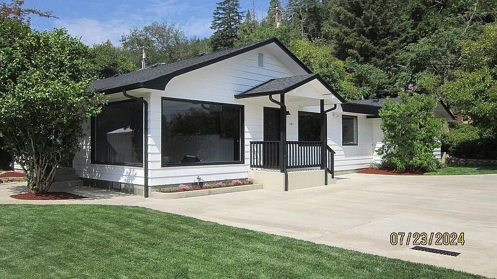 Immaculate newly refurbished home with beautiful panoramic views. Spacious open concept living room/kitchen/nook area adjacent to dedicated dining room. All new kitchen features stainless appliances, custom natural wood cabinetry and granite sink, new plank flooring , 2 bedrooms plus 3rd 13x22 bedroom/office/gym/ family room etc. Featuring built in bookcases, desk and storage. New landscaping and lawns with raised rockery garden and new irrigation system. New concrete driveway, patio and walkways throughout. New roof and gutters, two new ductless heating/cooling systems, new cedar fencing, new bathroom with custom cabinets, new site stabilization, drainage system, foundation footings and structural upgrades.