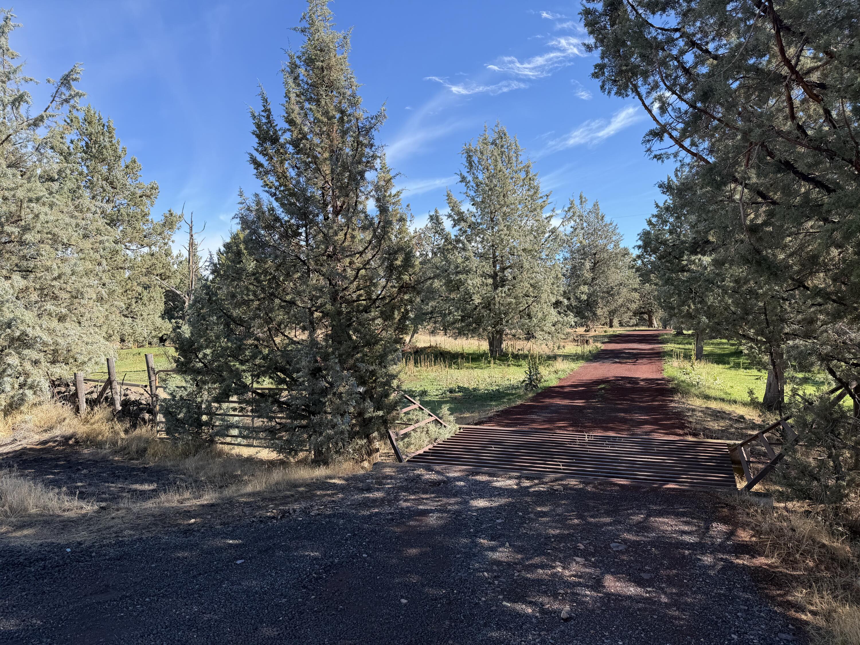 Discover 39.09 acres of peaceful rural living just minutes from Smith Rock State Park. This expansive parcel includes 30.2 acres of irrigation, providing plenty of opportunity for farming, ranching, or raising animals. With level ground and wide-open space, it's perfect for horses, cows, sheep, goats, or any livestock you choose. Enjoy the quiet countryside setting, surrounded by natural beauty and stunning Central Oregon views. Whether you're looking to build your dream home, start a farm, or expand your operation, this property offers endless potential in an unbeatable location. An additional 30 - acre parcel with a home right next door is also available from the same seller.