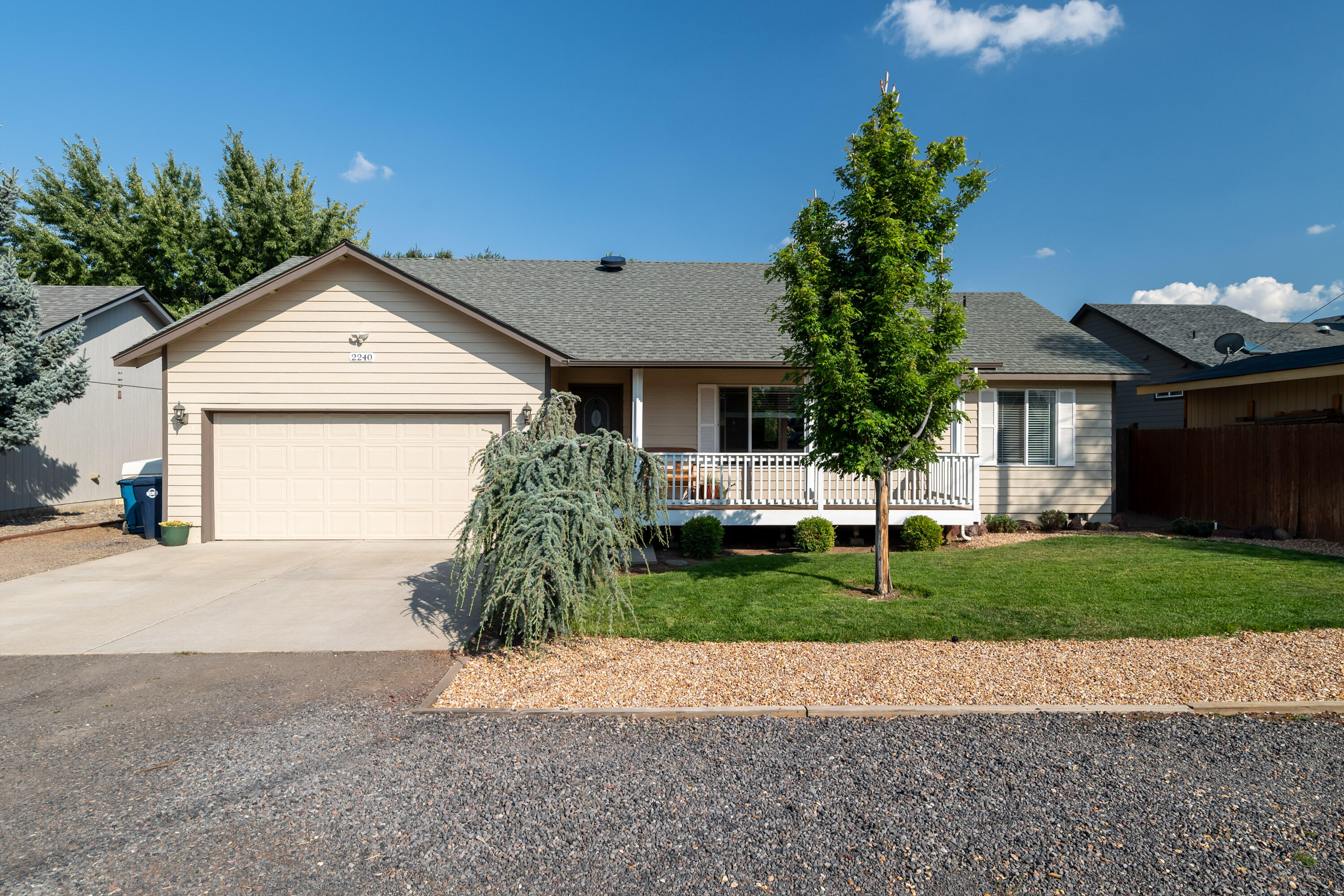 Welcome to this spacious, move in ready 3 bedroom, 2 bathroom home, featuring a bright and open floor plan, with nice modern finishes. This home shows pride of ownership with a well thought out living area ideal for entertaining! The kitchen is spacious with granite countertops and the primary bedroom is large enough to comfortably fit a king-sized bed and is nicely separated from the guest rooms. The primary also features an ensuite with a shower tub combo and generously sized walk-in closet. The two additional well-sized bedrooms provide plenty of space for family or guests. Outside you will find a fully fenced backyard with a covered back patio; perfect for year-round outdoor living, along with a handy shed that can be used as additional storage or as an office/workspace. The property also offers RV parking, adding extra convenience and flexibility. Close to parks, shopping, and Central Oregon's endless outdoor recreation, this home is a wonderful blend of comfort and functionality