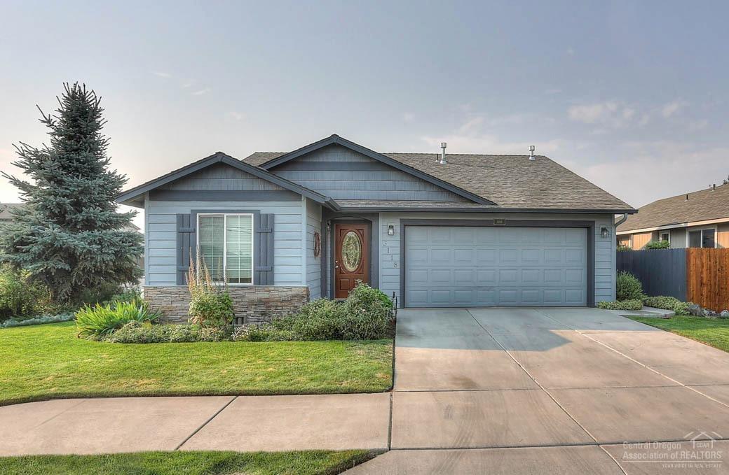 Better than new Turnkey single story charmer w lots of extras. Why fight for add-ons when you can get great value in this corner lot former model home & gardener's paradise. The award winning garden lets you know this home was lovingly cared for & ready for its next green thumb owner. Fenced yard, sprinkler system, oversized patio w pergola, Vaulted ceiling, Gas fireplace, AC, Custom entry door, B-bar, finished Garage, bathroom windows, front to back walkway & all appliances included.