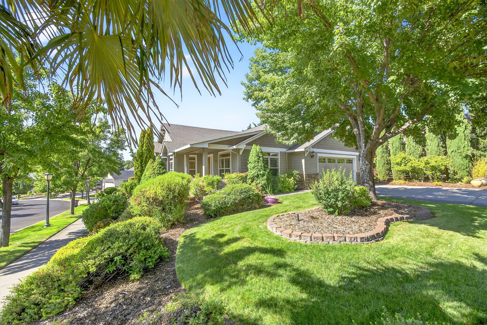 Single level 3 bedroom 2.5 baths with over 2400 sq ft.  Corner lot with views and  beautiful mature landscaping.  Immaculate condition with open and bright floorplan.  Dining, breakfast nook, office/den, plus large primary bedroom.  Easy care yard, large deck for entertaining, roomy front porch and more!  So many extra's in this wonderful Summerfield home.