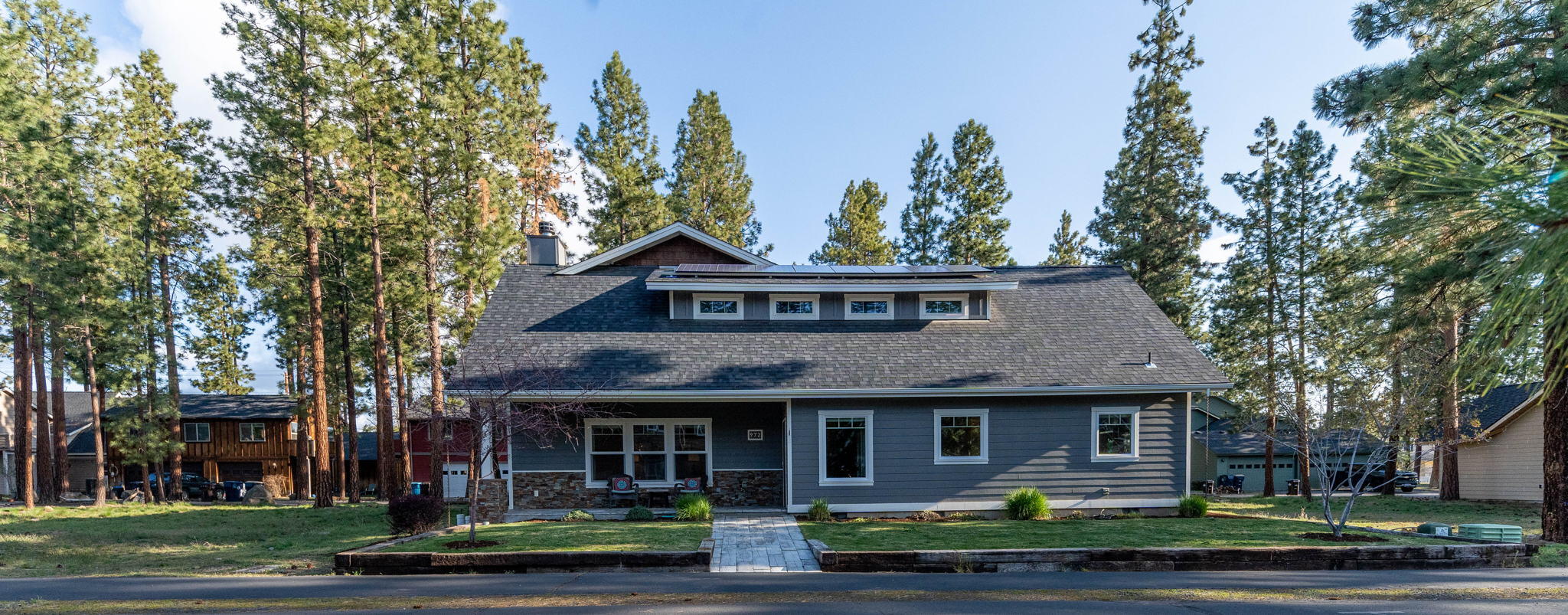 Beautiful, one of a kind Craftsman home w/ADU in a superb location! Main house has a beautiful foyer, bright living room w/fireplace, high end flooring, spacious modern kitchen, pantry & stainless steel appliances. Access from kitchen & primary to private patio-hot tub ready. Owner suite vaulted ceilings on main w/ 1/2 bath & laundry room. 3 car extended length garage w/double & single door, w/ a separate ADU entrance & parking. ADU is a one bedroom apt. Walkable to restaurants, schools & shops!