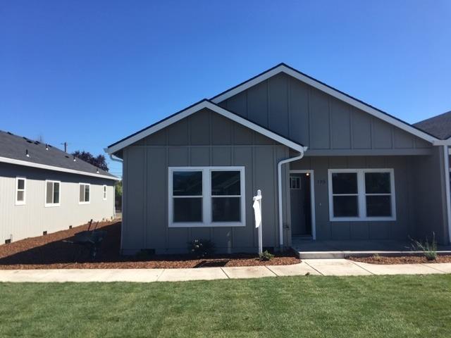 You'll love this quality built 3 bed 2 bath, attached 2 car garage zero lot line home! A fantastic open floor plan with vaulted ceilings- great for entertaining. The kitchen will showcase an island, good sized pantry, granite countertops, nice cabinets and laminate floors. The master will be large and ensued to include a large walk in closet, granite and lovely walk in shower. All bedrooms will have carpet and plenty of closet space. Energy trust certified. This one won't last long!
