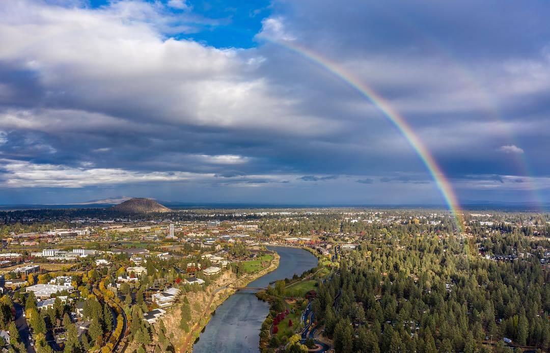 Welcome to this lovely Woodriver Village property. This unique neighborhood offers abundant nature, wildlife AND all the urban conveniences. Flat buildable land surrounded by mature trees and custom homes. Plenty of room to build on this property and be just down the road from the Deschutes River trail. Within walking distance to the river, the Old Mill, the Amphitheater, dining, shopping and of course coffee. Buyer to do due diligence on development potential, Utilities at the street.