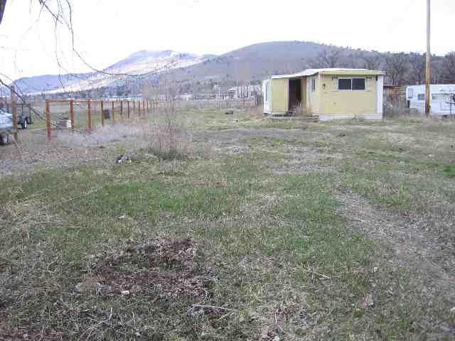 Nice 1/4 Acre Lot With Well (Well Was Vandelized And Needs Pump/Casing) And Older Manufactured Home That Needs To Be Removed. No Well File. Agents, It May Not Be Safe To Enter Mobile Home - Be Careful!