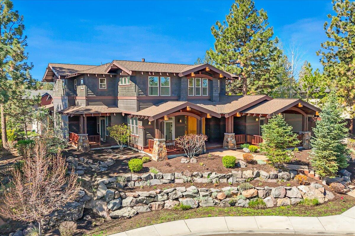 Spacious Quality Built Craftsman Home in the Heart of NWX. Situated on a private .25-acre lot in a quiet cul-de-sac, this exceptional 4 BD, 3.5 BA, 3,564 SF craftsman home offers a unique layout centered around a warm and inviting courtyard—a perfect blend of indoor & outdoor living in the heart of Northwest Crossing. Designed for comfort & versatility, the home features 2 expansive primary suites, each w/ its own private covered patio (one on each level), a dedicated office, & 3 living areas, ideal for relaxation & entertaining. The spacious, light-filled interior incl. real wood floors, custom cabinetry, fresh int paint, new carpet & lighting. Exterior offers fresh landscape, multiple mahogany decks, hot tub w/ mtn views, concrete courtyards & pathways, & a 3-car garage with ample storage. Ready for the new owners to add their own personal touches, this home offers endless possibilities & is in one of Bend's most coveted neighborhoods, steps from parks & the vibrant amenities of NWX