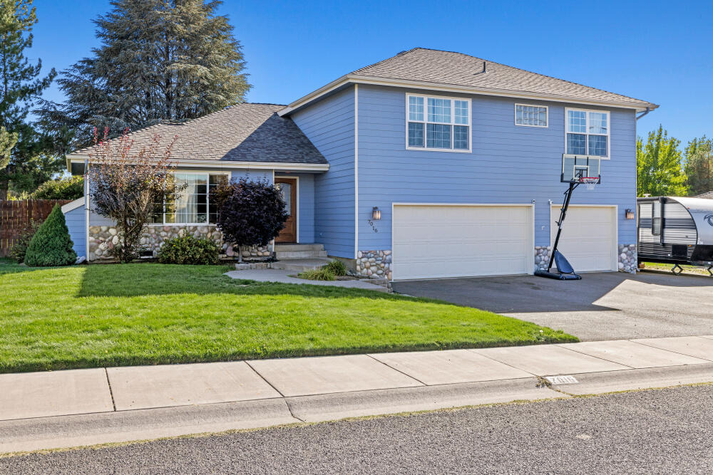 Incredible home in a great neighborhood! This 4 bedroom 3 bathroom home is well designed and has been very well taken care of. Pride in ownership shows throughout! Featuring 2 separate living rooms, a great kitchen with an open concept, a 3 car garage, and RV parking as well! The floor plan has one bedroom and one full bathroom on the lower level. The front living room has been tastefully updated with a clean and crisp feel and fireplace. The primary bedroom features a walk in closet, and a nice primary bathroom with dual vanity sinks, and a dual shower walk in tile surround shower. The lot this home is on is level, and the backyard is fully fenced. It has a nice gazebo patio cover, lots of space for entertaining, as well as privacy that is provided by the trees. This home is turn-key, clean, comfortable and listed at a great price!
