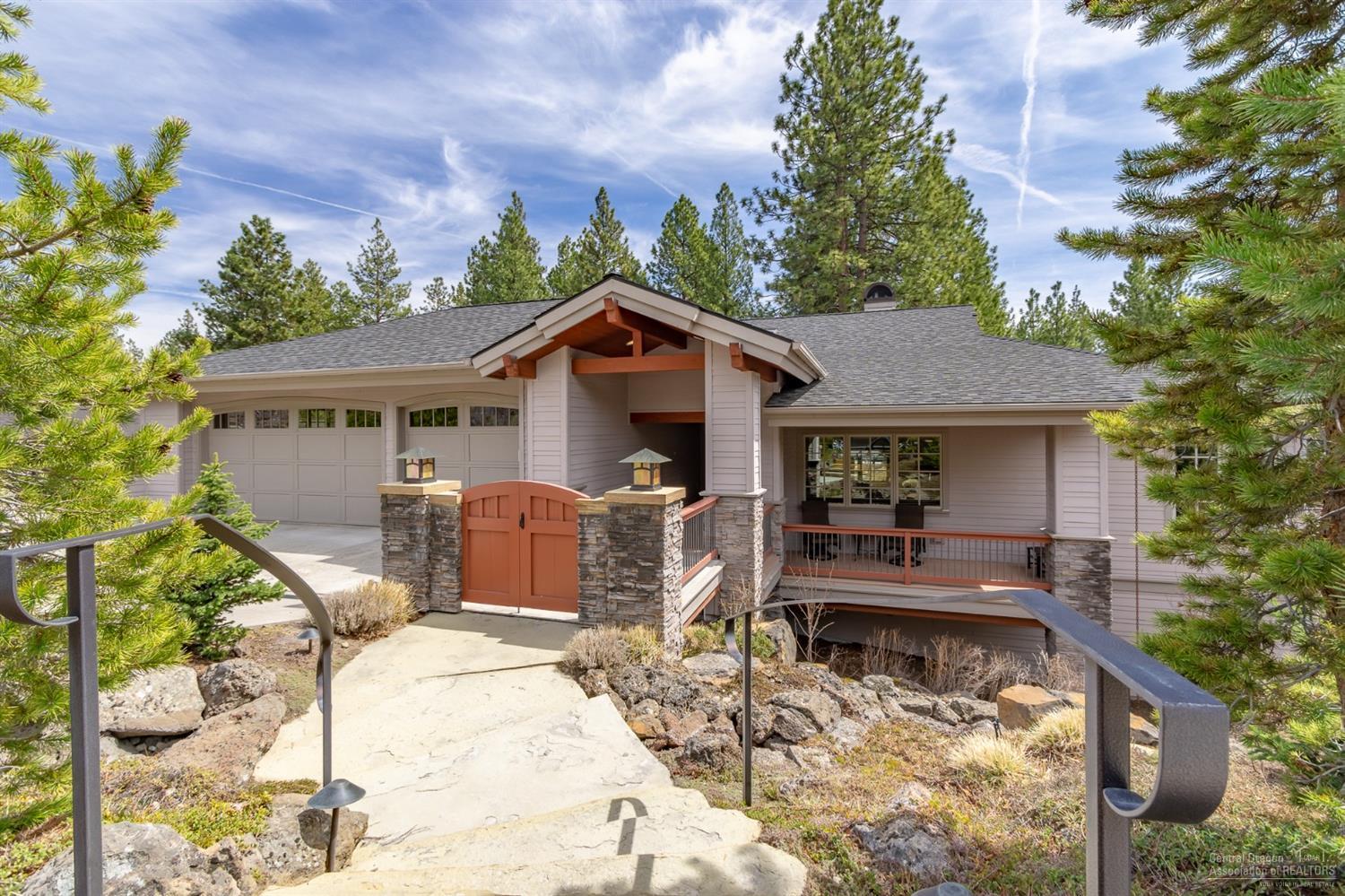Stunning home in The Reserve at Broken Top! Sounds of the water feature greet you as you enter this amazing home. Great room w/stack stone fireplace & picture windows that look out to your forested oasis. Large dining area & cook's kitchen with top of the line appliances, breakfast bar & wine cooler. Expansive back deck is ideal for entertaining. First floor has a master suite & bathroom w/ double vanities, jetted soaking tub & huge walk in closet. Master has French doors leading onto your deck. Two additional bedrooms, (or den/office) & full bath upstairs along with laundry room. Downstairs are 3 additional bedrooms, 2 w/ adjoining bathrooms & bonus area. Amazing media room w/speaker system ideal for movie night or to watch the big game. The downstairs patio has a lawn area and hot tub. Trails out your back door and fantastic schools nearby. Three car garage w/epoxy floor for all your toys. Down the street from shops, restaurants & Farmers Market in Northwest Crossing.