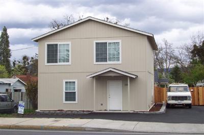 New in 2004! Multi units. Front unit is 1400f, 2 story, 3 bedrooms, 2 baths, includes laundry hook-ups, new appliances, carpet, vinyl. Downstairs floor is marbled cement. All the new rage! Units have no garages but 3 parking spaces. Rents for $900.00/mo. Back unit is single level, 700f, 2 bedrooms, 1 bath and laundry hook-ups. Offers 1 car parking. Rents for $750.00/mo. Access back unit by alley.