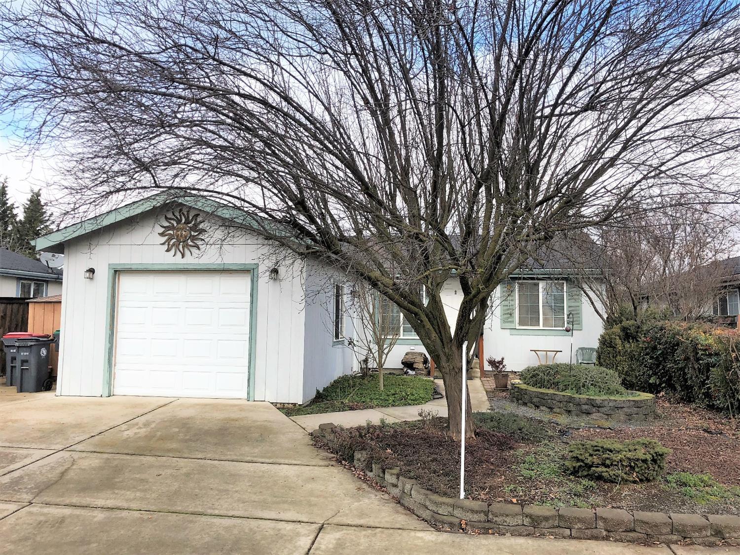 Gorgeous, Well-Maintained 2000 Manufactured Home on Its Own Lot in the Fabulous Shelterfield Estates Area. This great Fuqua-built home is move-in ready with vaulted ceilings, beautiful Oak flooring and a big open floor plan. The original floor plan had 3 bedrooms, but the Seller has removed one room in order to expand the dining and living areas. There's a large, fantastic master suite and 2 full baths as well as an inside laundry room and storage shed in the completely fenced and landscaped, private back yard. Store all your vehicles and toys in the attached, finished, 1-car garage and there is even a nice, paved area to store a small RV or boat if you remove the small storage shed. Don't miss this great opportunity on a full-financeable home. Bring your clients, they will love it.