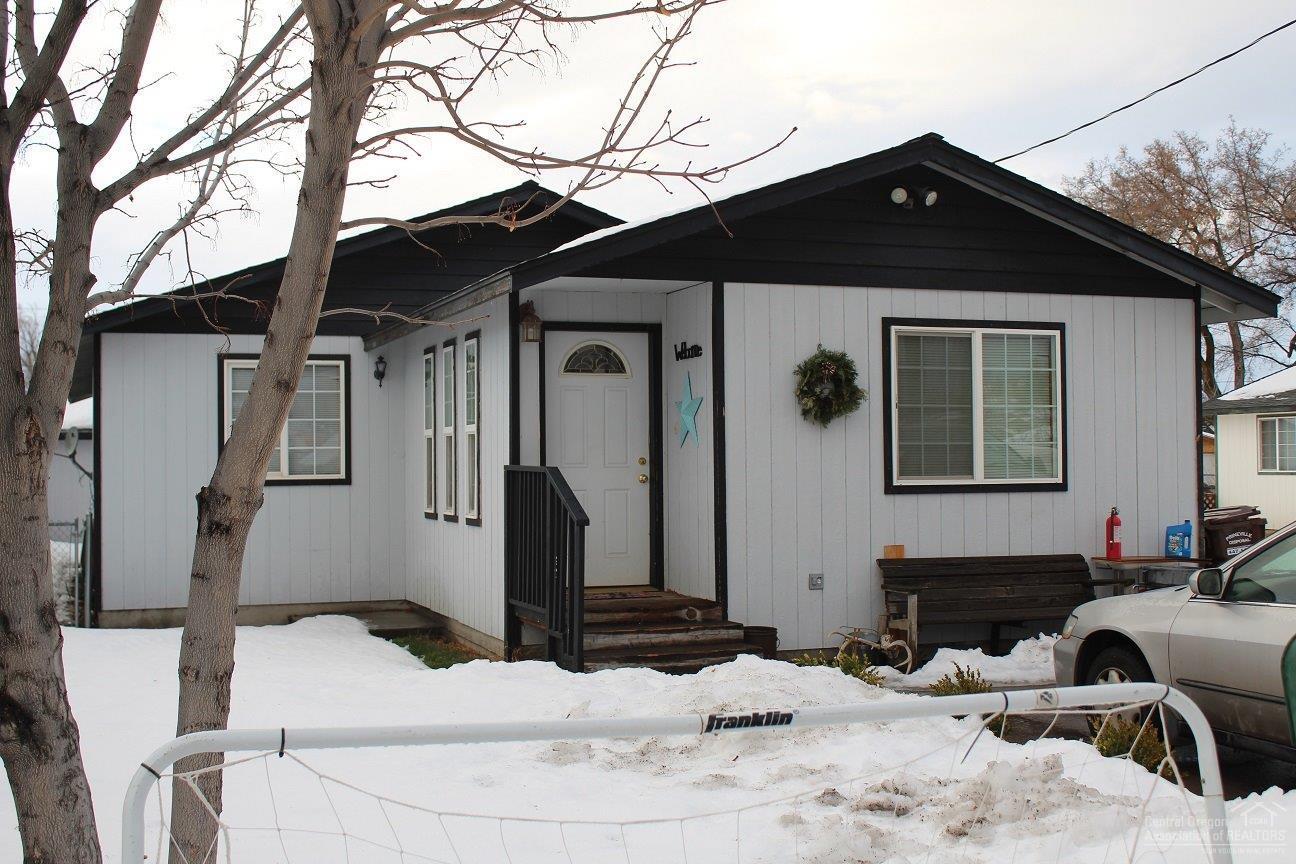 Well care for 4 bedroom 2 bath frame built house in town, close to everything and not in the 100 year flood plane. House was built in 1999 so it has vinyl clad windows and good insulation. Wooden floored 12x12 storage building behind the house convenient and very secure. Priced to sell quickly at owners request. House includes refrigerator, stove, dishwasher, disposal, plus washer and dryer. Covered deck on the north side of the house.