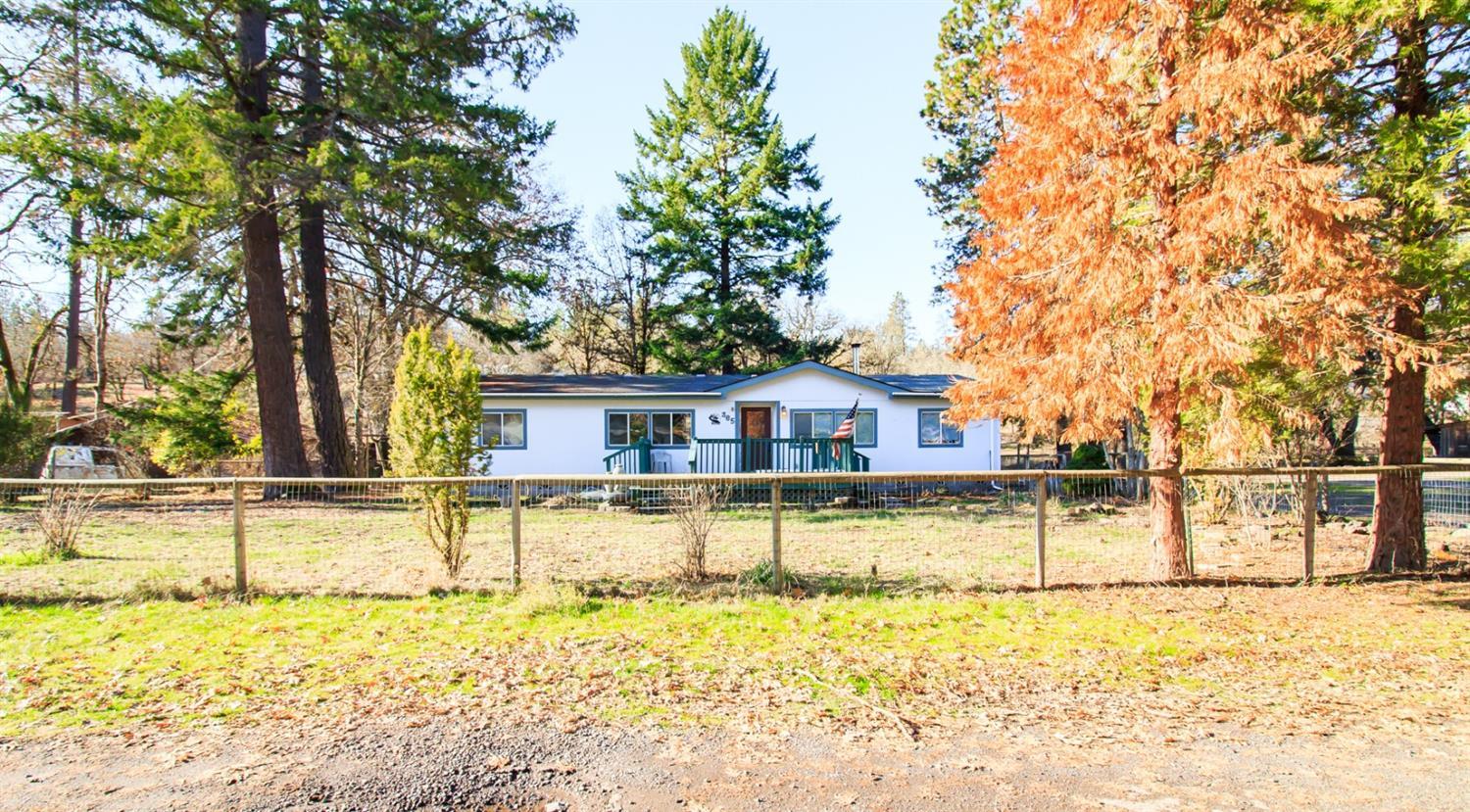 Tucked away enough to enjoy the peace and quiet but still close to town and the mighty Rogue River. The enclosed gazebo in the back yard gives the opportunity to embrace the serenity, regardless of what weather southern Oregon may throw at you. The property also has a shop for your toys and another small man-cave right behind the shop.