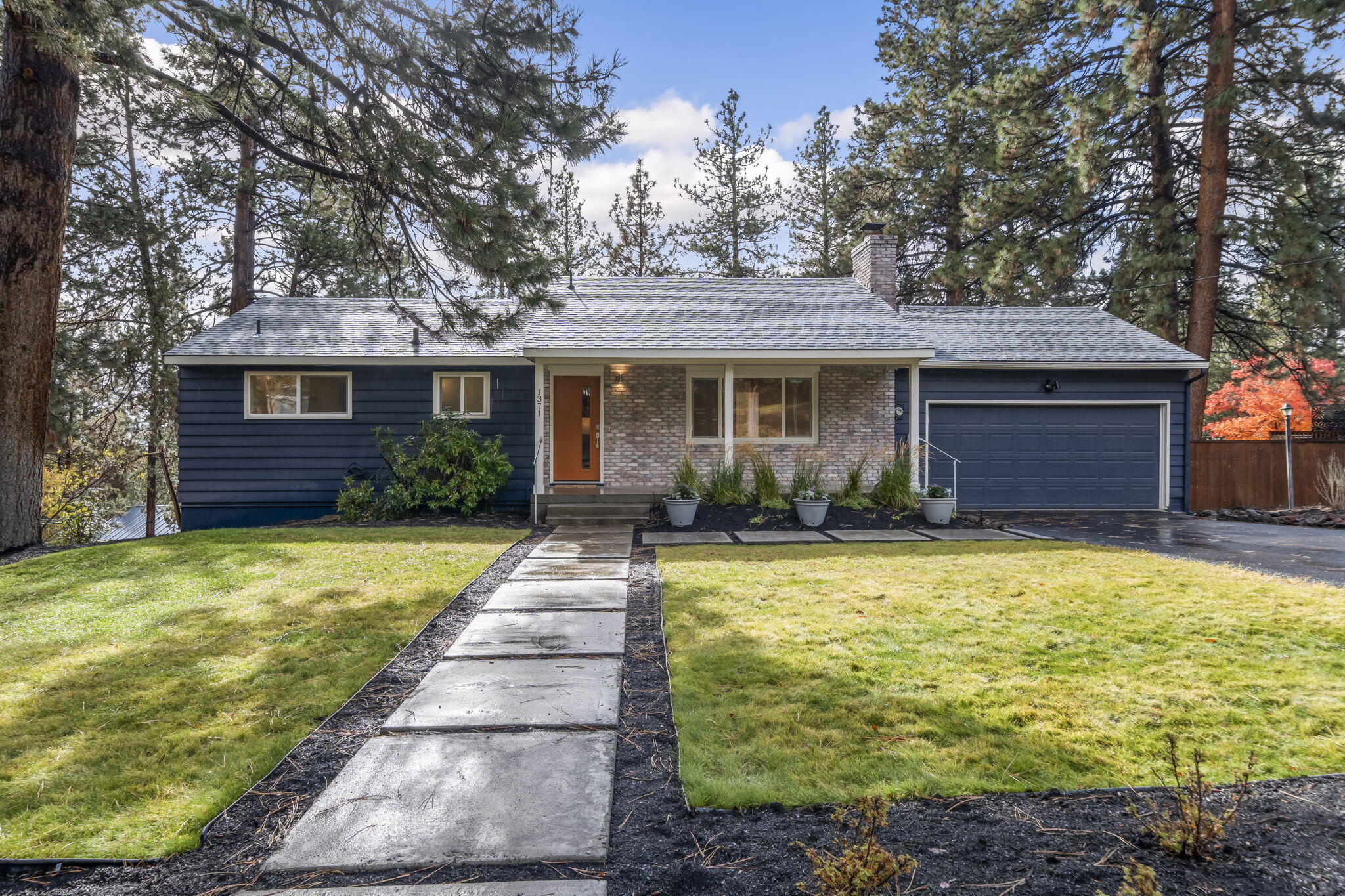 Welcome to this stunningly remodeled Westhills gem, blending classic charm with modern luxury! This spacious home sits on a generous lot, offering a backyard framed by beautiful mature trees. Off-street parking for your RV, boat, and more. Step inside to a welcoming space filled with natural light, where every detail has been thoughtfully updated, from the sleek, modern kitchen to the new engineered hardwood floors. On the main level you will find a fully redesigned kitchen featuring new appliances, quartz counters, and new modern cabinets. Large living room with refinished fireplace, new mantel. Dining area w/new lighting, new windows, and new flooring. Also on the main level is a fully updated primary suite w/large walk in closet, updated bathroom w/teak vanity and dual sinks, tile shower with dual fixtures, modern lighting and mirrors. Downstairs features large bonus room, 3 bedrooms, full bathroom, and large laundry room. Discover your new lifestyle in this lovingly remodeled home