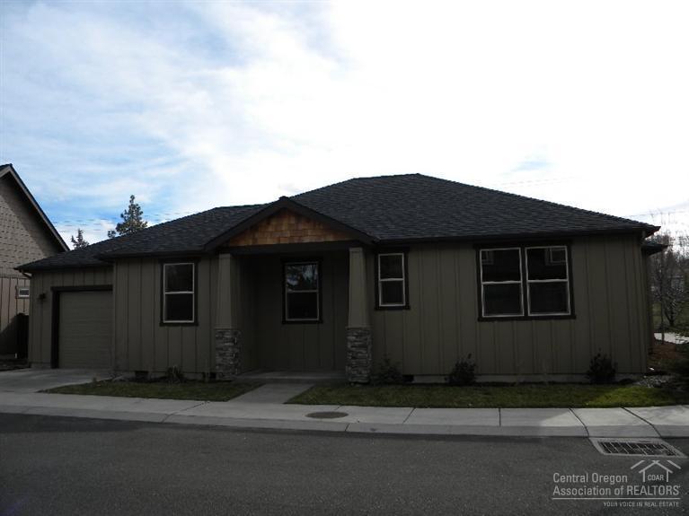 Now complete single story; it's adorable! Beautiful and functional finishes include, Knotty Alder custom cabinetry & trim, S/S appliances, hand textured walls, blown-in insulation, high efficiency gas furnace & hot water heater, laminate flooring throughout the main living areas and much more! Pull-thru garage (doors at each end) for ease of parking a trailer behind the fence and a nice size backyard. This home has an open light and bright floor plan!