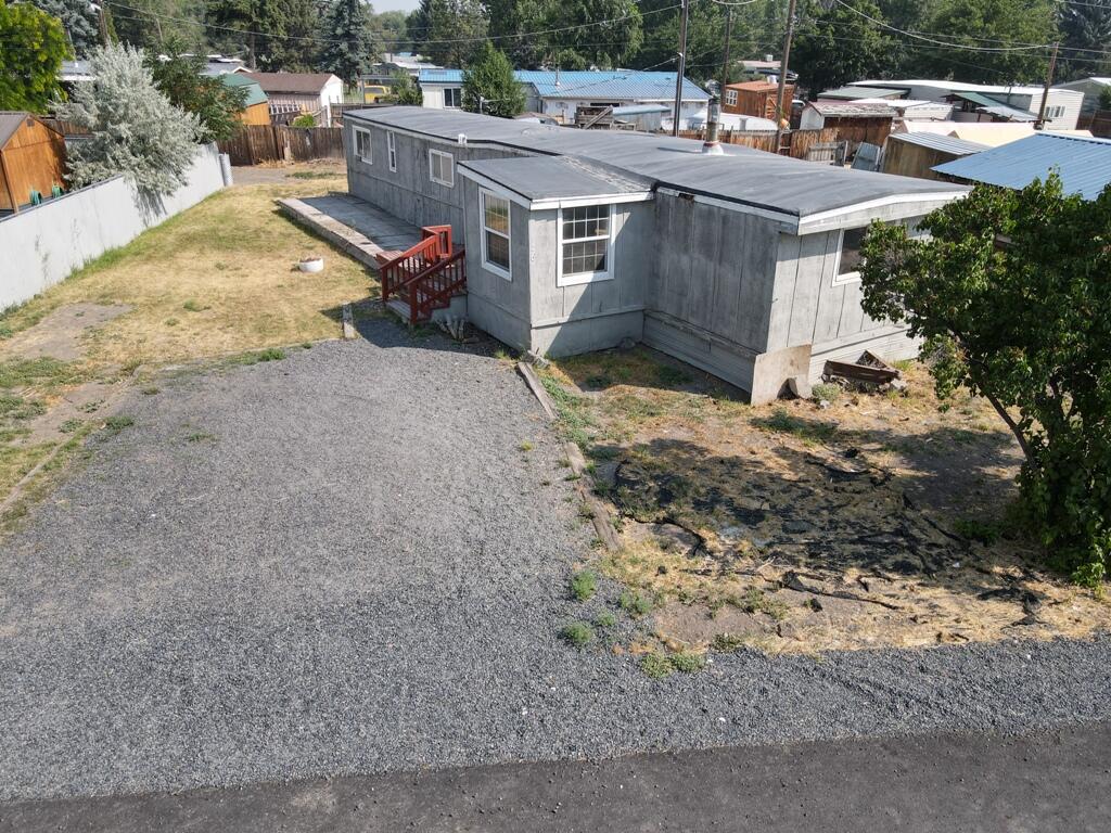 Bring your energy and vision to complete the renovations that have been started on this is a 2bd., 1 ba. 1974 single wide mobile. The carpet has been pulled and the walls painted. There are new tiles for the bathroom floor and new flooring for the kitchen and hall just waiting to be put in. There is a pellet stove and electric wall units for heat.

Outside there are two storage buildings for your storage needs. The decks and yard need some TLC but the roof is newer, only about 3-4 years old. Also, most of the property is out of the flood plain. So, bring your DYI skills and energy for a great investment opportunity!

Owner will carry with $55,000 down. Motivated seller!