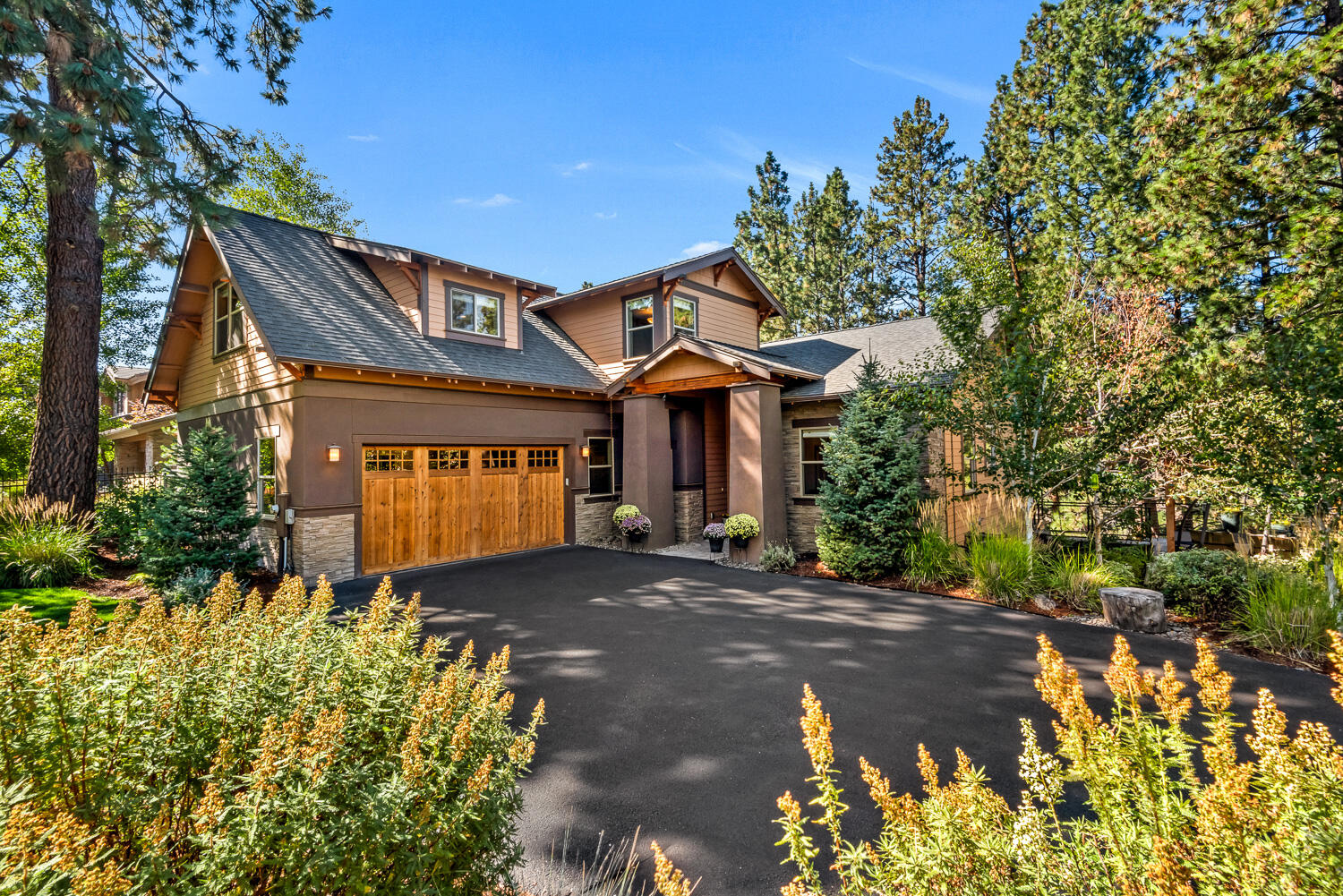 Once-in-a-lifetime opportunity to own a private, gated legacy property just minutes from downtown Bend, offering sweeping, unobstructed views of the Deschutes River. This 3,040 SF residence perfectly blends authentic Northwest character with timeless comfort—featuring hardwood floors, a cozy wood-burning stove, and walls of windows that bring the river's beauty indoors. Designed for both everyday living and unforgettable entertaining, the outdoor living space boasts a stone fireplace, heated covered seating, a tranquil water feature, and mature landscaping for year-round enjoyment. Whether hosting friends or savoring a quiet morning, this rare riverfront retreat delivers the lifestyle so many dream about. With its unmatched setting, exceptional design, and close proximity to all that Bend has to offer, this is truly a legacy property of lasting value in one of Central Oregon's most coveted locations.