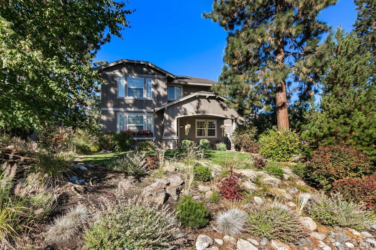 The Parks at Broken Top is a much sought-after area on Bends Westside. Nestled in the trees, this established neighborhood boasts several grassy parks & picnic areas, a swimming pool & basketball court. With 3000 sq ft, this home boasts 4 generous sized ensuite bedrooms, 1 ensuite bedroom downstairs, primary & 2nd bedroom suites on second level. The 4th spacious bedroom & bath is located above the garage & could easily double as a wonderful bonus room. The home centers on the great room with vaulted ceilings & walls of windows for natural light as well as the freshly remodeled kitchen by renowned contractor, Neil Kelly.  Created with style and functionality, no details were missed. Gorgeous solid quartz counters & spacious island with bar seating, high quality cabinetry, SS appliances & a cozy & comfortable built-in banquette for gatherings at meals.  Engineered floors throughout the main level and private backyard & deck for outdoor enjoyment completes this wonderful versatile home.