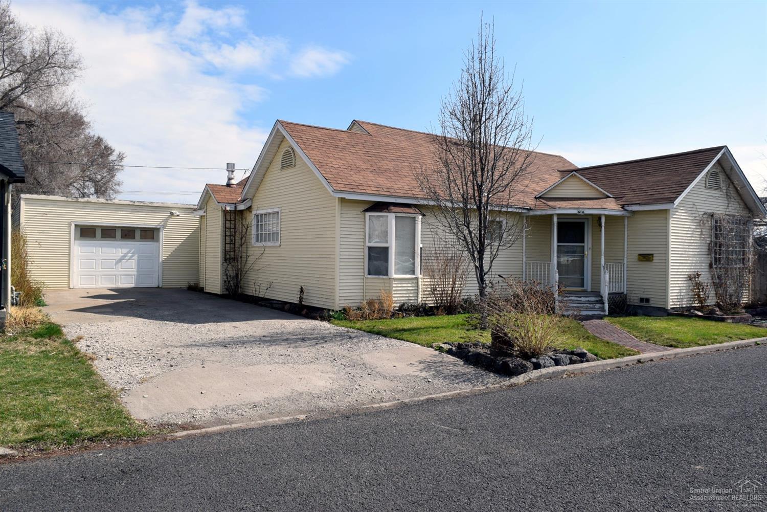 Charming Remodeled Cottage with Victorian Flair in 1283 sq ft, 2 bed/2 bath, bonus room, archways, Poplar cabinets, natural gas cook stove, wood floors, claw-foot bathtub, bay window, newer electric and plumbing, fully insulated 6 inch exterior walls, floor and attic, per Owner. Secluded retreat from deck, with custom 3-D privacy fence, perennials, ornamental trees, irrigation well. Garage/shop has 220 + 110 w/extra outlets, storage with loft, so much more.