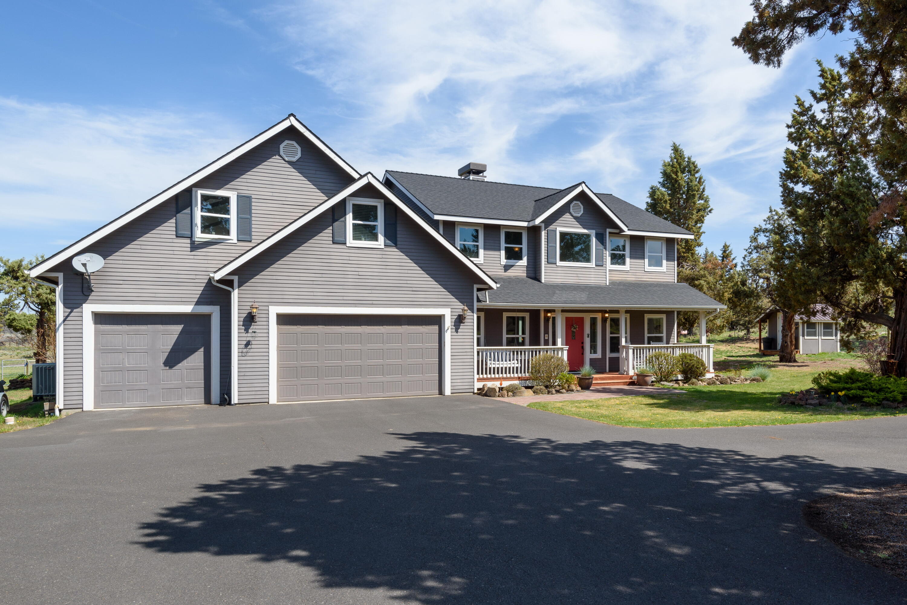 Incredible, custom-built farmhouse sitting on over 3.5+ acres with views of Smith Rock. This home has undergone numerous upgrades and improvements over the past few years including Granite tile counters and ceramic backsplash in kitchen. 
Complete with 4 bedrooms, 2.5 baths, a bonus room and a den, this home make great use of the space provided. New Hickory hardwood flooring, new carpet upstairs and a paver patio with a 20x15 pergola. 

The chef's kitchen includes built in ovens, a 6 burner cooktop, built in fridge and breakfast bar great for entertaining. The property includes a large, fenced garden, an insulated chicken coop, small 3 stall animal barn and a fully fenced pasture great for sheep, goats or cows.