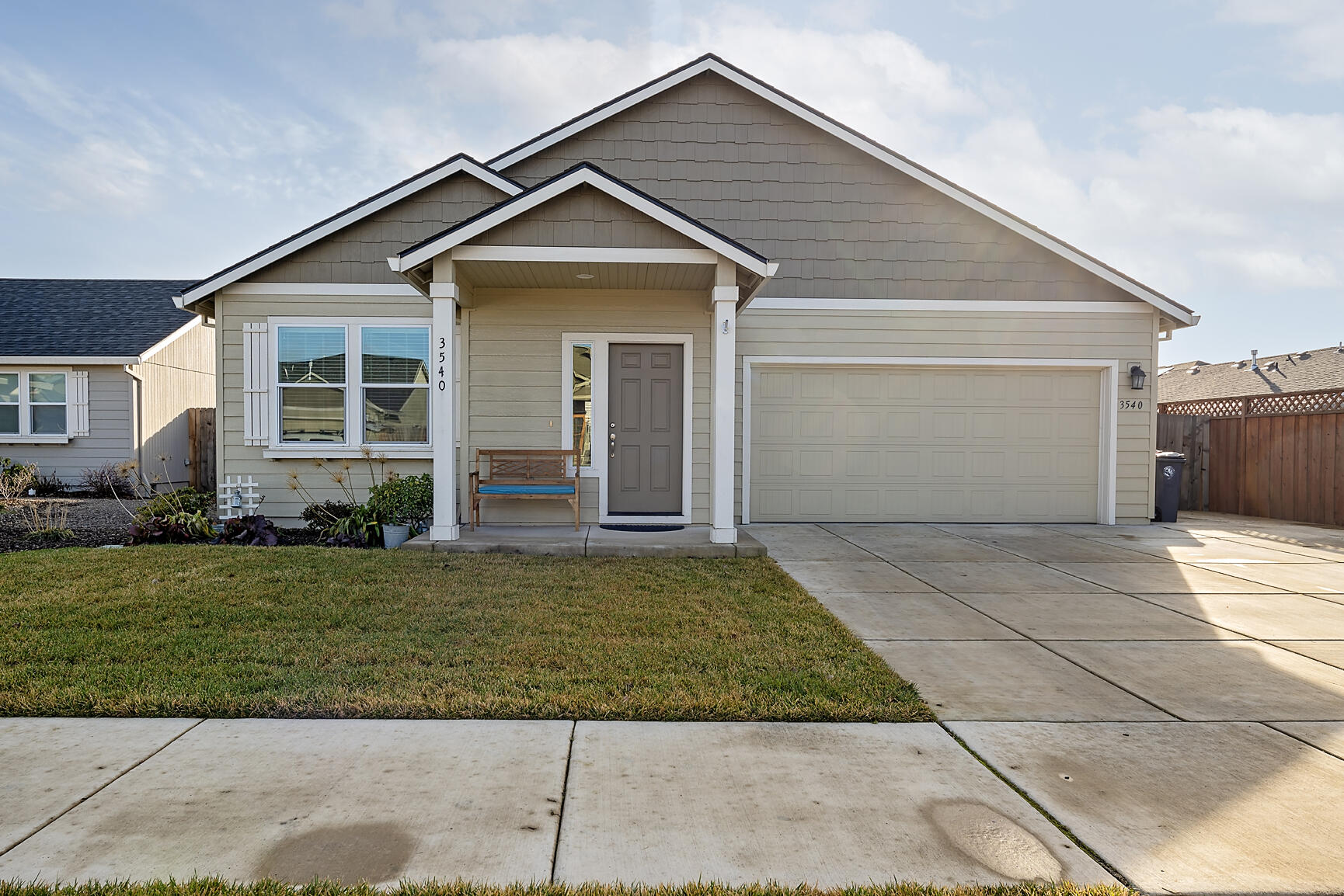This Hudson floor plan was built in 2019 by Hayden Homes. This single level 3 bed/2 bath has 1574 sf with an open floor plan. The kitchen is the heart of the home with beautiful granite countertops, spacious cabinets and pantry, gas stove and stainless-steel appliances included.
The private main bedroom is well appointed with the ensuite featuring dual vanity, shower, and walk in closet. The 2 guest bedrooms are near the front of the house with a shared bathroom in the middle. The living room is a comfortable and relaxing space with access to the backyard through the dining area. Covered patio and another patio/slider off the main bedroom. Inside laundry including washer and dryer. The property is fenced, landscaped with timed sprinklers front and back. This is one you don't want to miss out on. Come see it in person.