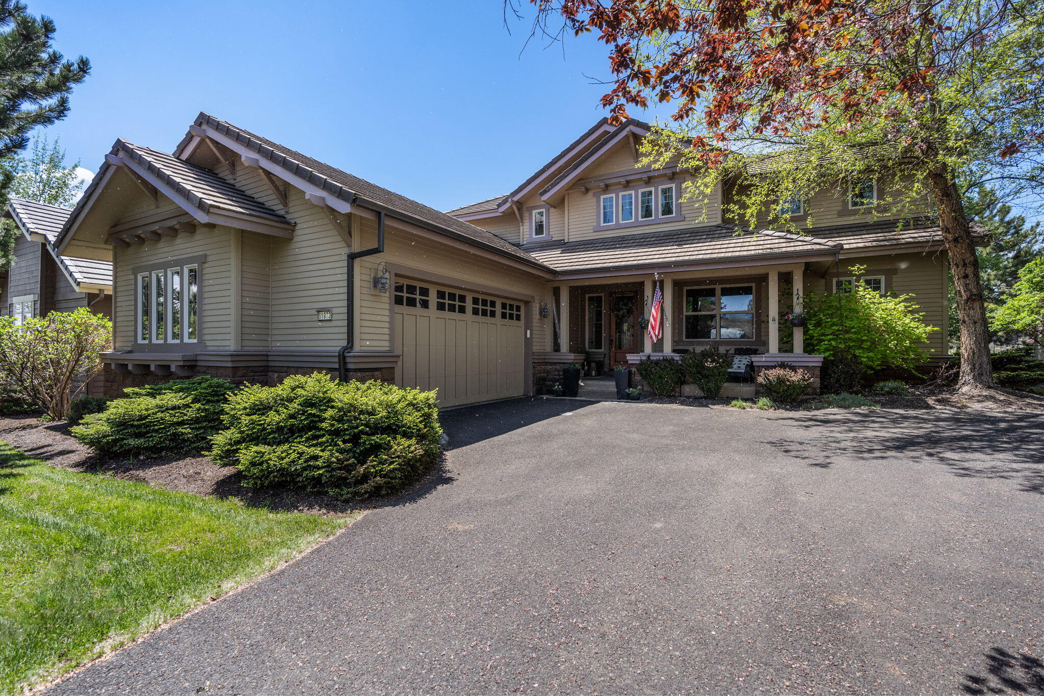 This charming Broken Top home with covered entry welcomes you into an open great room plan with soaring ceilings, hardwood flooring, gas fireplace and large windows with views towards the Cascade mountains. The kitchen offers ample cabinetry and a large eating bar and the dining area also enjoys access to covered patio, perfect for outdoor entertaining. The main level includes a large primary suite as well as a private office off the entry. Upstairs you'll find a comfortable bonus room, an en-suite Guest room and a third guest room with access to the third full bath. Located in Fall Creek at Broken Top, this property benefits from front yard landscape maintenance. One of Bend's most sought after Westside communities, Broken Top offers gorgeous golf course views, paved community walking paths throughout and excellent dining at the Broken Top Restaurant. Optional Club Memberships include golf and tennis, pickleball fitness center and seasonal pool.