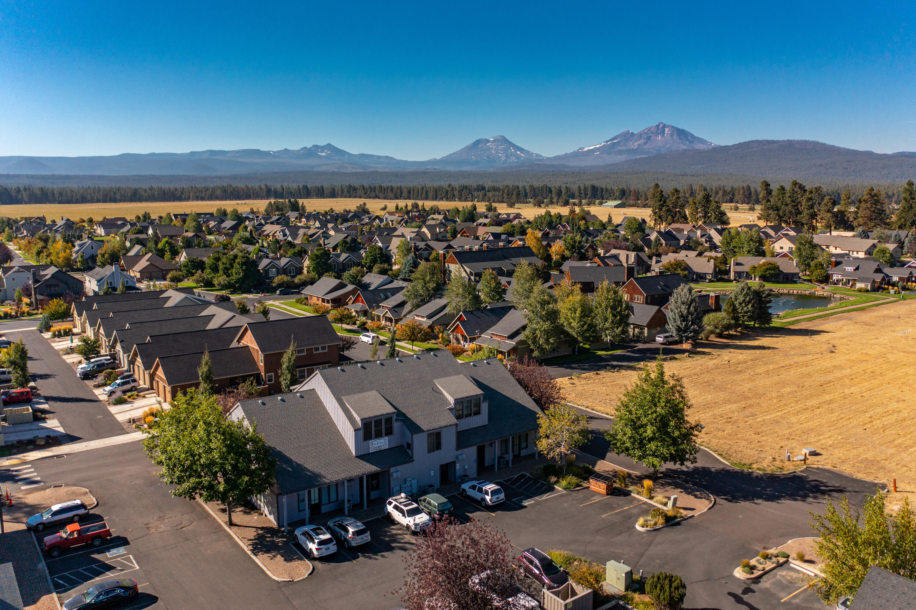 Exciting investment opportunity in the heart of mountain country! The mixed-use building is 100% leased with three retail tenants on the ground floor and two apartments on the second floor. Each apartment has their own porch with mountain views. The building provides easy access to and from Highway 20 and is within walking distance to shops and restaurants in downtown Sisters. The building has upside potential on current rents with tenants on short-term leases.