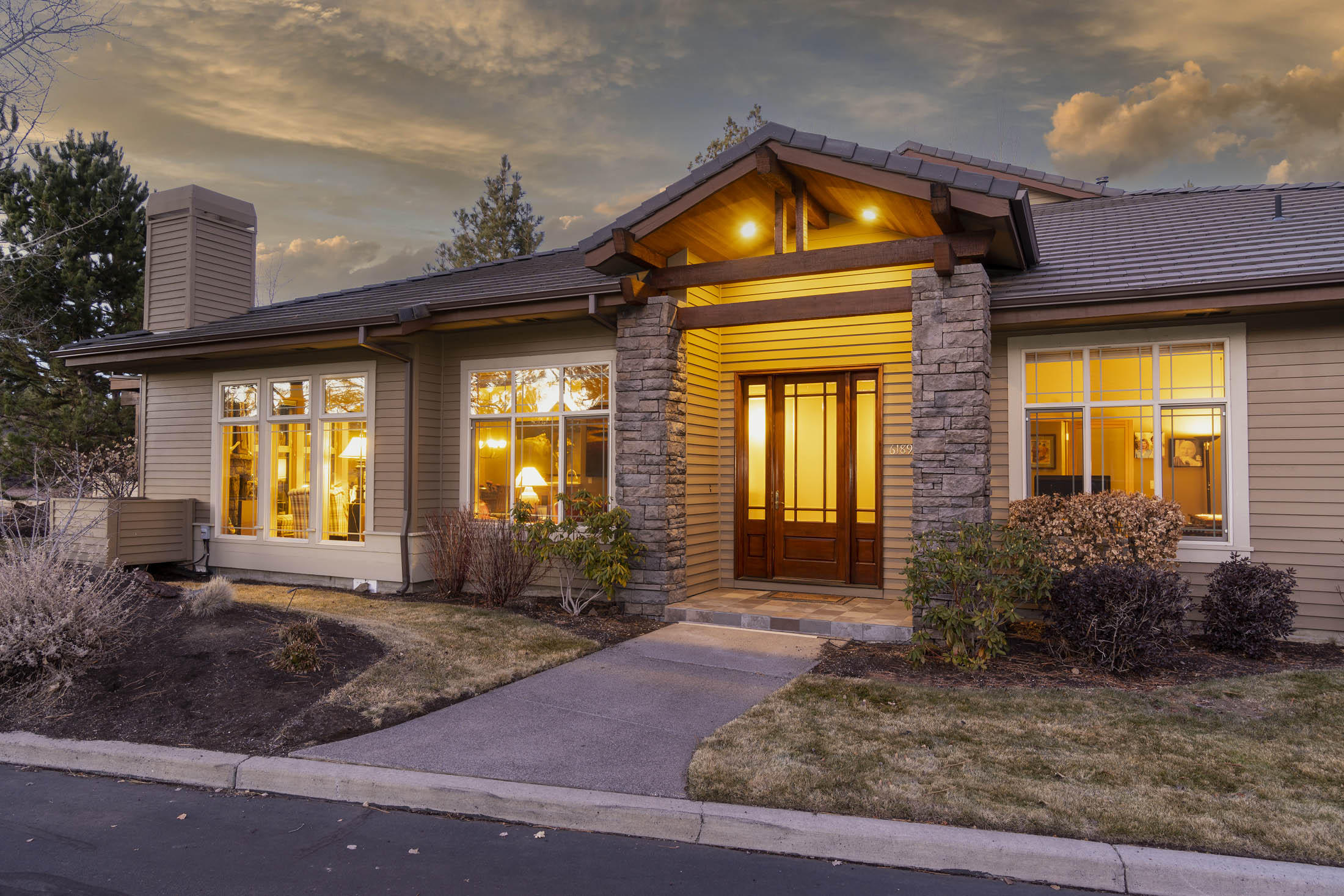 SINGLE LEVEL Broken Top Townhome in the Whisper Ridge neighborhood, w/ beautiful views of the golf course & rock outcropping, highlighted by floor to ceiling corner windows making it extra bright & cheerful.  Very rare & sought-after single level floor plan features spacious owner's suite w/ private access to golf course view patio, 2nd full-ensuite guest bedroom & 3rd bedroom that also functions perfectly as a work-from-home office.  Lovely great room w/ gas fireplace is large enough for separate sitting area.  Dining & kitchen also enjoy golf-course views & access to patio, from which to enjoy fabulous sunsets & glow of the morning sunrise.  Landscape & exterior maint. provided, leaving you time to enjoy the great Central Oregon lifestyle. Ideally located, just a short stroll to the Broken Top Clubhouse & Restaurant. Minutes to Mt. Bachelor, Deschutes River, bike trails & downtown Bend. Optional club membership provides access to golf course, tennis, pickleball, pool, fitness center.