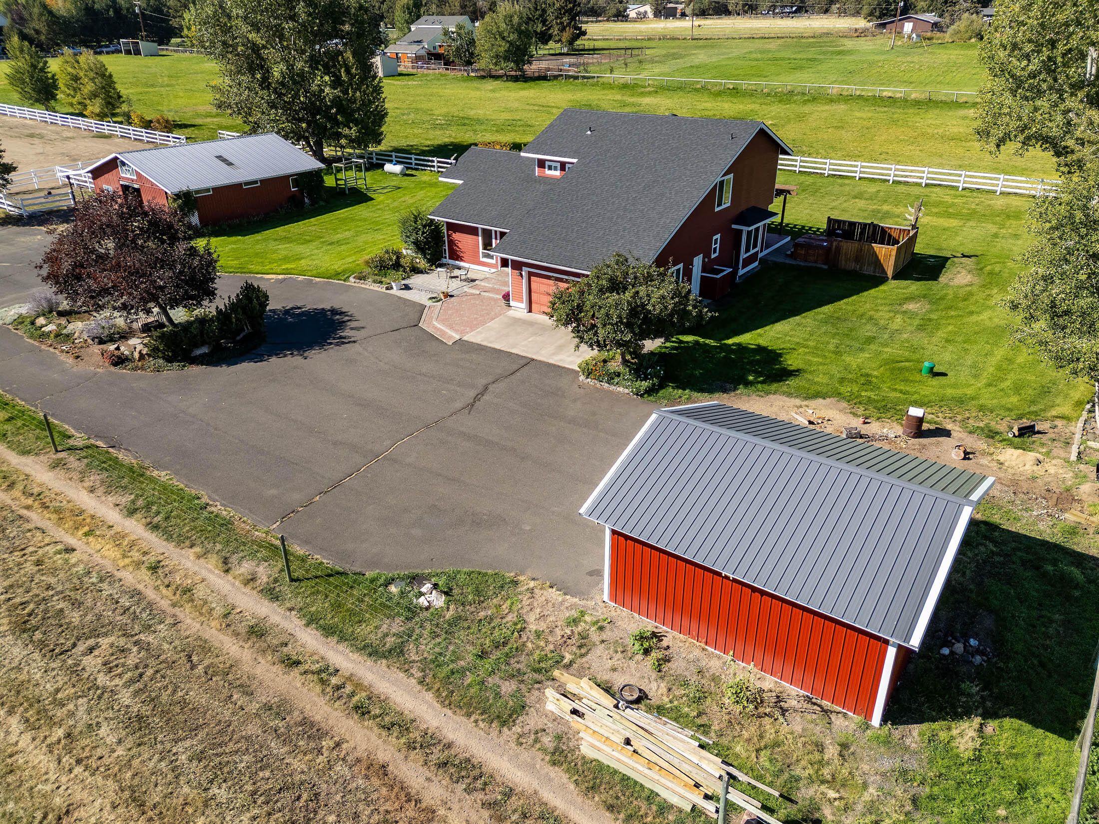 5 acre irrigated Tumalo horse property. 3 stall barn with run outs, tack room, hay storage, power and water. Arena, Two loafing sheds in pasture. vinyl and top rail wire fencing and machine shed. 
Gorgeous 2400+ square foot home with views from every room. 3 bed 4 bath plus office & mud room. Decks look out at Cascade mountains and open pastures. 
Underground sprinklers in yard and pasture. Private well and 4 acres of irrigation water rights with a private pond and pump house.
Superbly maintained, roof and HVAC only 4 years old. New sprinkler system in yard. 
Set up your showing today!