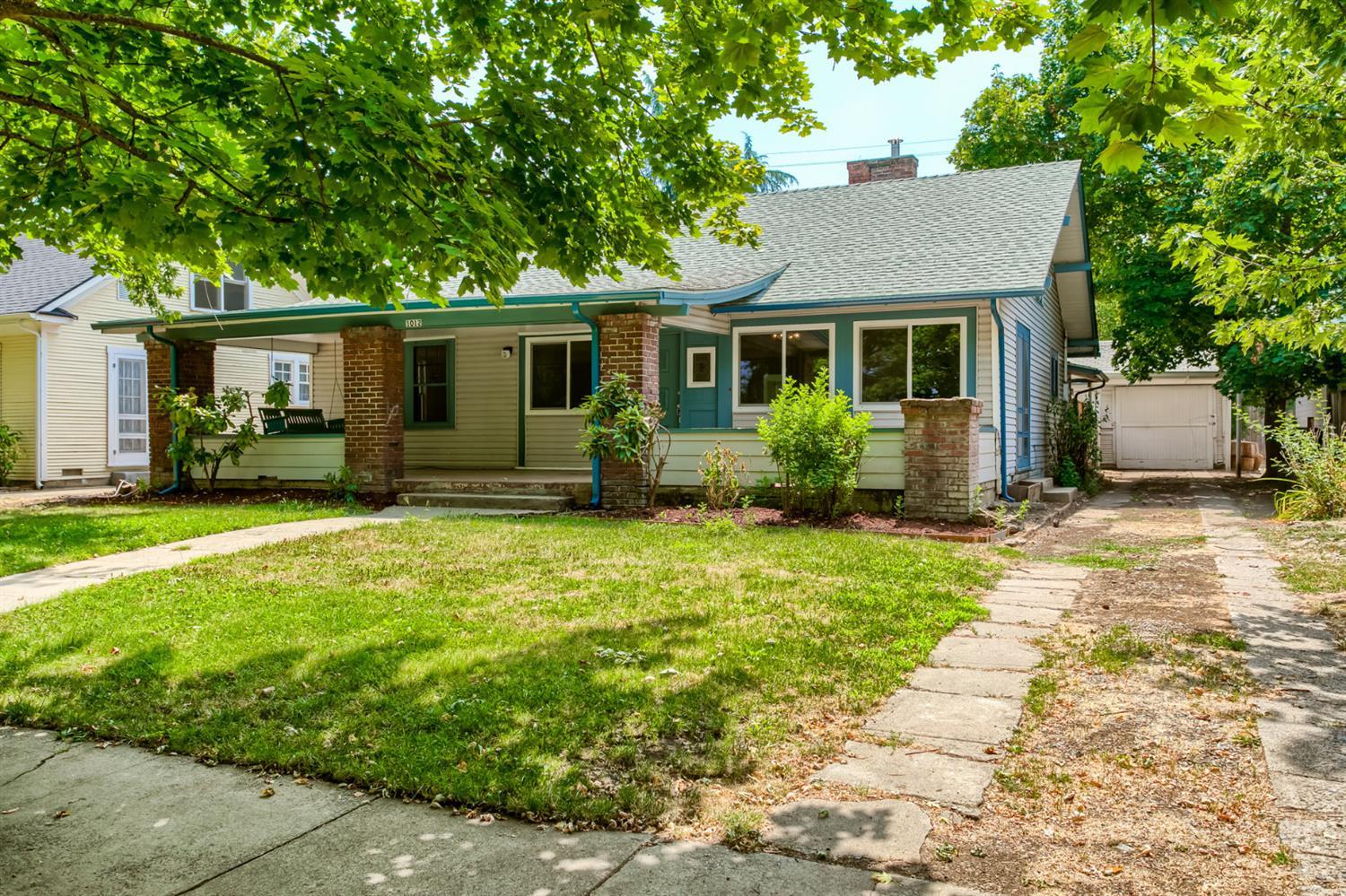 You'll love charming, tree-lined Queen Anne Avenue. This home is in solid and clean condition so move right in or take it to the next level with your personal remodel ideas making this home in this neighborhood a real gem. There are oak or fir floors throughout most of the home, a spacious living room and fireplace with woodstove insert. The yard is a nice size with a detached garage. This home was just painted inside and painted outside within the last few years. The roof is only a few years old.