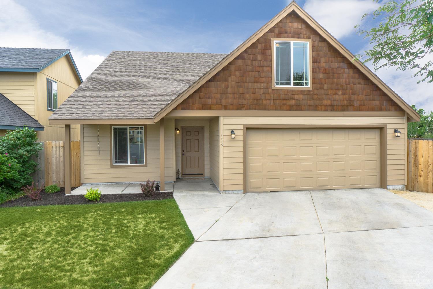 Summer fun awaits in NW Redmond! 4 bedrooms PLUS a loft and office w/ a Master on the MAIN level. Home was just redone in December and is in great condition. Vaulted living room w/Gas fire place, new laminate flooring & carpet. Spacious Master looks out to the back garden space. Loft at the top of the stairs overlooks living area. 4th bedroom upstairs is really a Bonus Room w/a door! Open kitchen w/ breakfast counter & SS appliances. Fully fenced, auto sprinklers, huge back yard awaits your creativity!