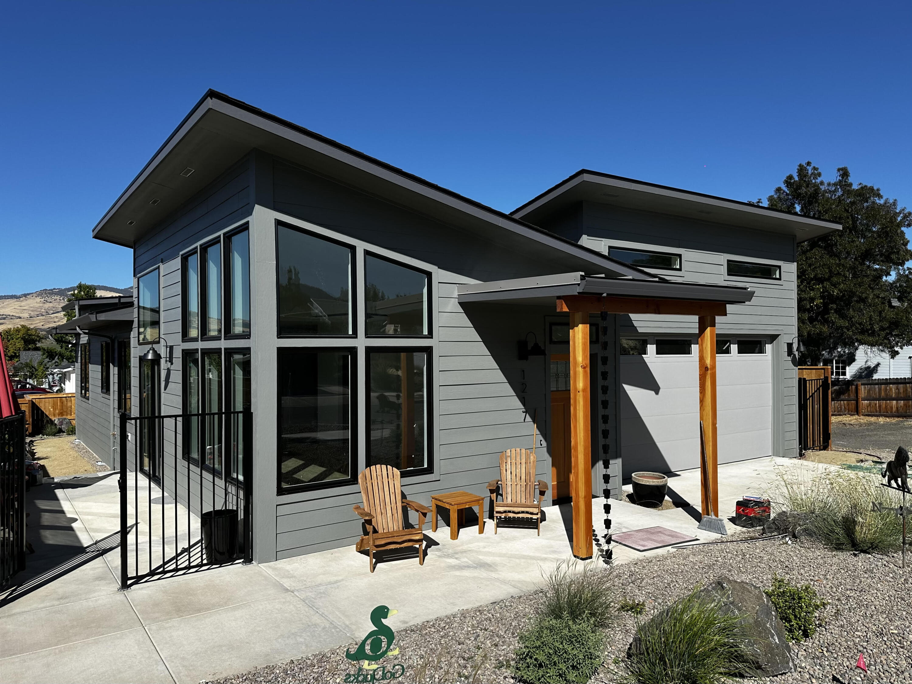Welcome to Lot 25 in the Beach Creek Subdivision - a beautifully designed 3 bedroom, 2 bathroom home offering 1538  square feet of modern living space.  Thoughtfully built by KDA Homes, this residence is part of Ashland's vibrant Zero Solar community and is ideally located for easy access to all that is this charming town has to offer.  With a sleek, contemporary design and large windows that capture stunning views  of the surrounding mountains, the home is filled with natural light throughout.  It's certified Earth Advantage Platinum for sustainability and features , residents enjoy access to a community garden, three nearby parks, and a private park managed by Beach Creek, making this an exceptional place to live, relax and thrive.