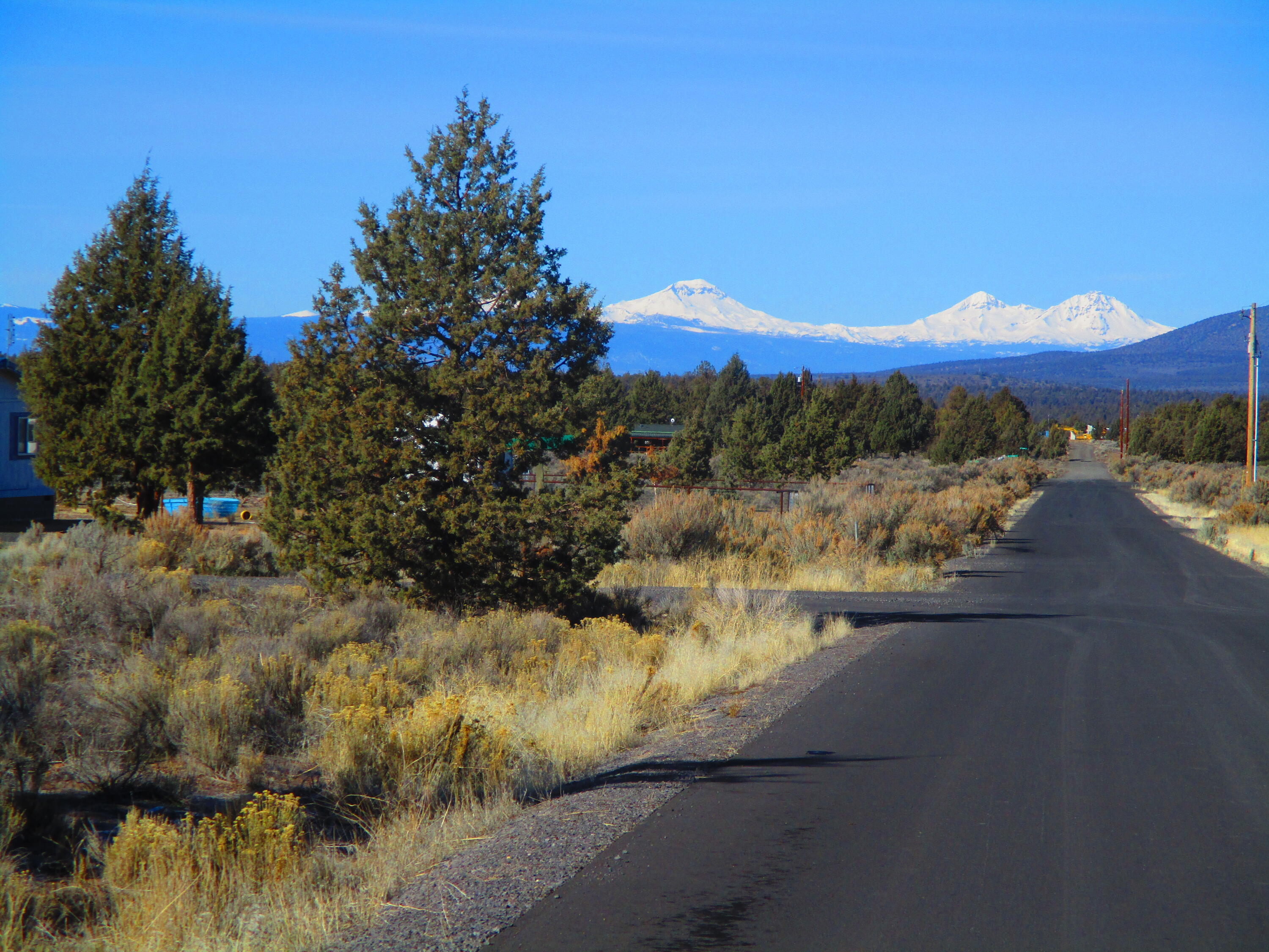 Country living is here on this nice 1.81 acre lot located at the corner of Snake and Teton! This is a wonderful opportunity to set up your dream home. There is also plenty of room to have a shop, barn, chicken house - whatever your imagination can come up with for your toys and critters! Call your favorite agent to take a look today, you don't want to miss this one!