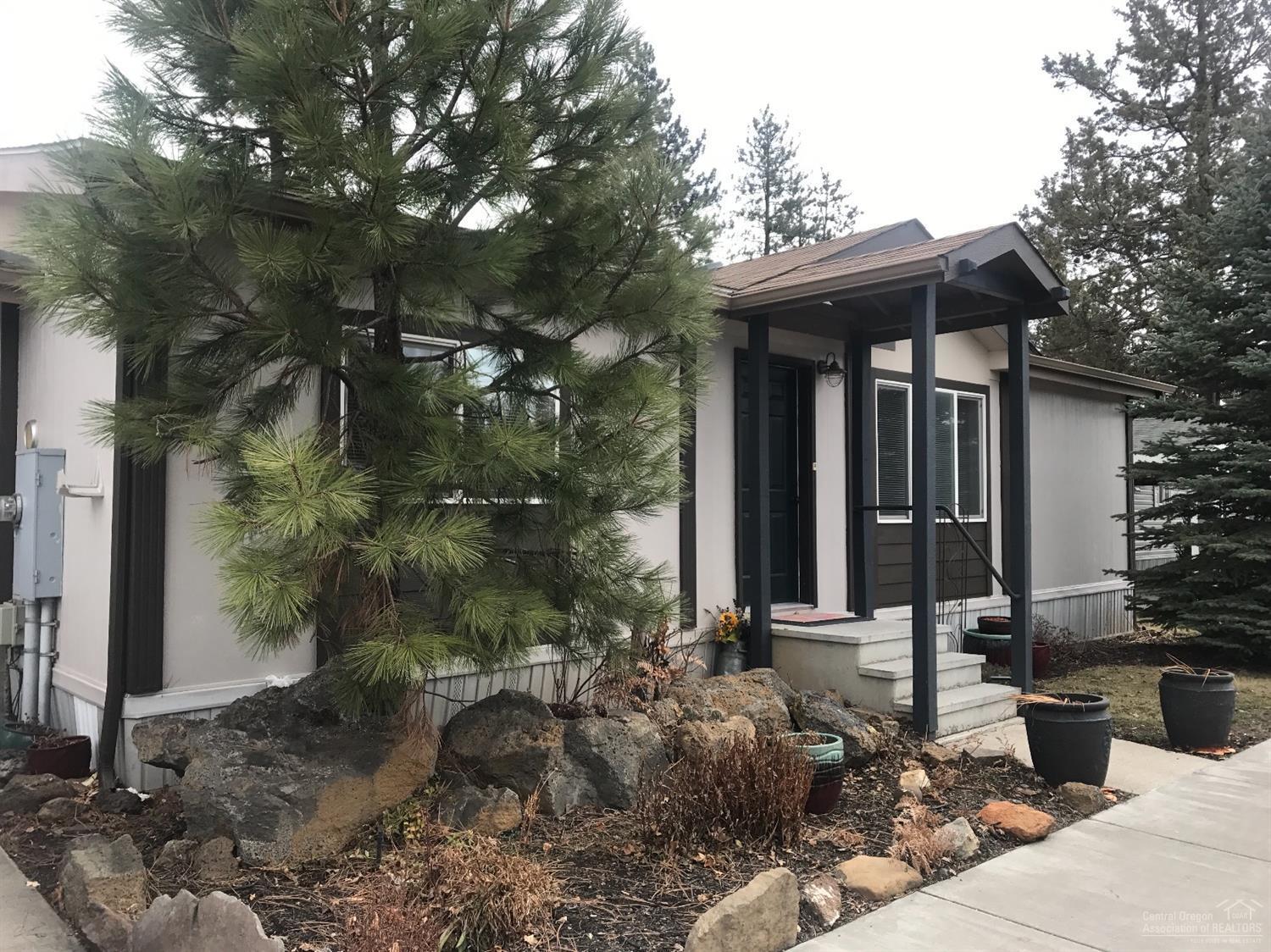 Updated single level home tastefully remolded from a designer. New carper, flooring, appliances and paint. Large washroom and garage. Fully fenced with patio and shed. Leased land. Affordable living. No subleasing allowed. Paved roads and park down the street.