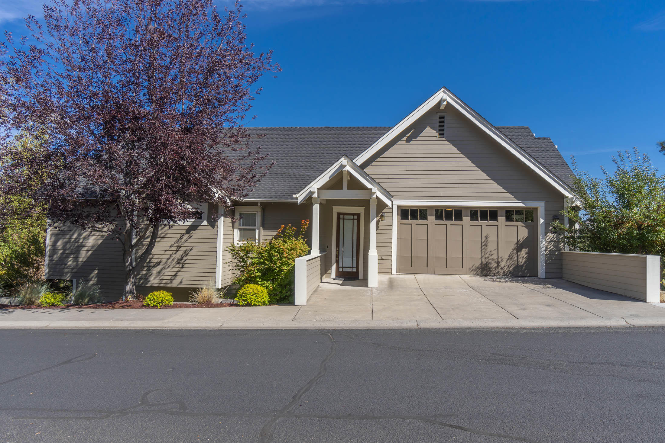 Perched above the Deschutes River with Outstanding Panoramic Views.  This home has it all with Direct Access to the River Trail & just 1 mile to Downtown Bend.  Spacious floorplan with ''Walls of Glass'' allowing Wonderful Natural Light.  Gourmet Kitchen with Cabinets Galore, Large Walk-in Pantry and Spacious Dining Area Surrounded with Floor to Ceiling Windows which Capture the Beauty Outside.  Master Suite is on the Main Level with Fireplace, Soaking Tub, Dual Vanities & Massive Walk-in Closet.  Downstairs are 3 En-Suites with Individual Full Baths allowing your Guests Complete Privacy with Family Room and Separate Flex Room.  Enjoy Outdoor Entertaining on the Deck and take in those Glorious Views. Tons of storage below home!  Don't miss this Opportunity to live on the River!