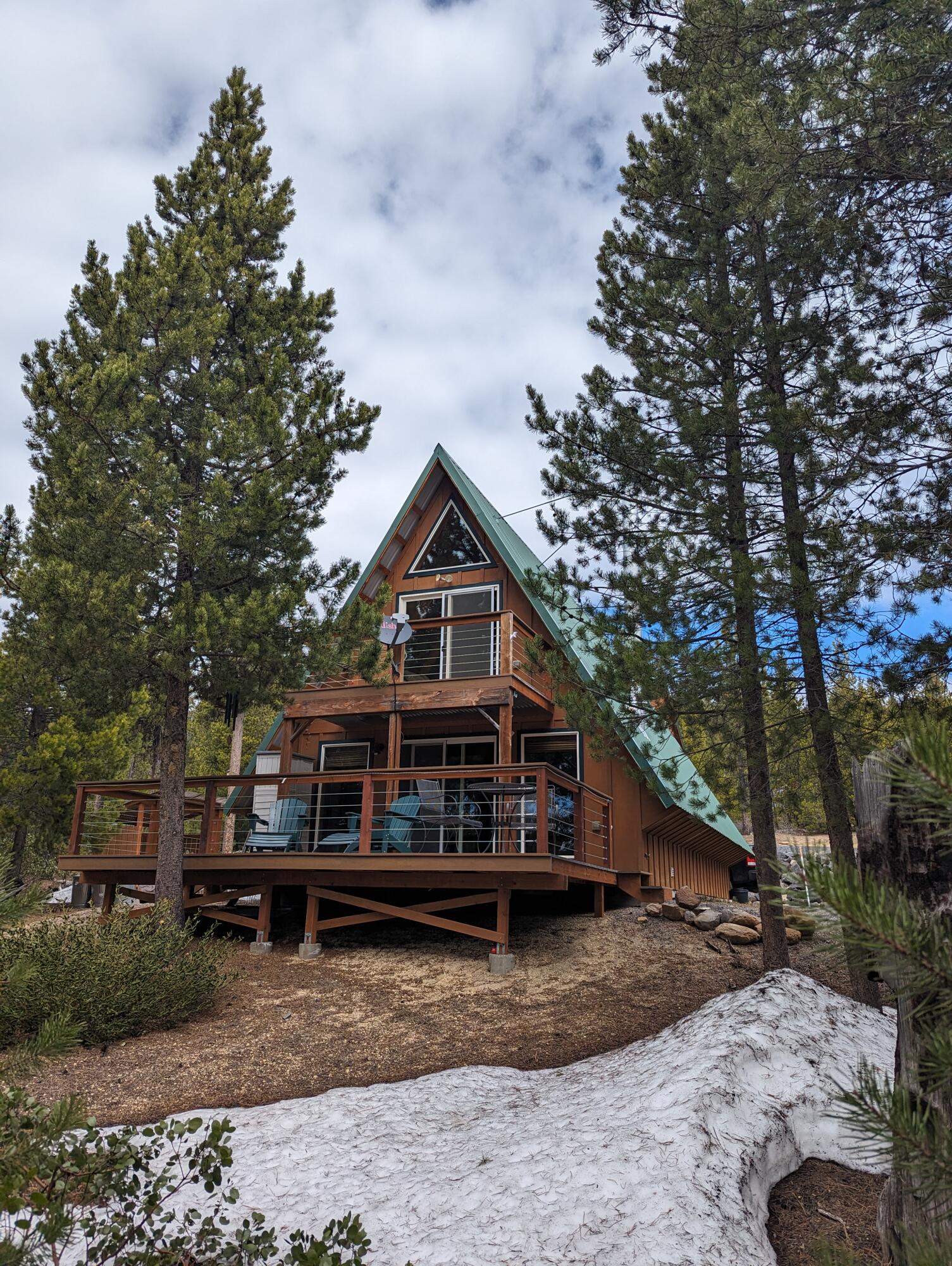 Beautiful A-Frame cabin on an acre close to Crescent, Odell Lakes and Willamette Pass ski resort. Large garage with 776 SF upstairs usable space in addition to the 1088 SF main cabin for approx 1864 sf of furnished space. There is 280 sf of maintenance free deck for chilling after a day on the lake. Full laundry facilities in lower bathroom and this cabin will come completely furnished!  Main cabin upstairs has a loft style bedroom and another bedroom separated by a half bath for privacy. Cabin is 1088 SF, per county assessor and the newer 30x28 garage has 840 SF first floor parking/storage space and 776 of vaulted furnished space upstairs not included in county total and there is a half bath downstairs. Plenty of room for all your toys.  Boat, snowmobiles, small RV or van? no problem with 9 ft and 11 ft doors and 29 feet of depth. Come and see this wonderful set up for family fun and enjoyment. Owner is an licensed Oregon real estate agent.  Lic# 201245478