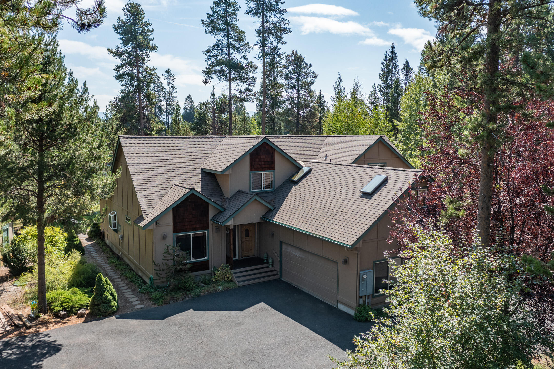 Unbelievable opportunity - It is rare to find a property like this beautiful home on Lunar Drive on 2 lots (1.63 acres) on the Deschutes River (199.9' of river frontage), an approved NEW TREX walkway and dock along w/a lot across the street. (.55 acres).  Two master suites on the main level with a bonus room off the great room that can be used for a reading area or a work out room,  Plus there is a craft room too.  Upstairs features another area that has a bed (needs a closet) and has a bathroom, a loft and a large bonus room/bunk room w/a deck overlooking the river. There is a 2nd garage (26' x 26') with a work bench and storage area for kayaks and toys.   Other features include: a new 20' x 8' Trex boat dock & walkway, a gazebo, a tree house, beautiful landscaped yard with a sprinkler system, a hot tub, RV hook up, security system and a great deck & patio to enjoy the outdoors.  This home is a ''must see'' for someone seeking the good life in Central Oregon