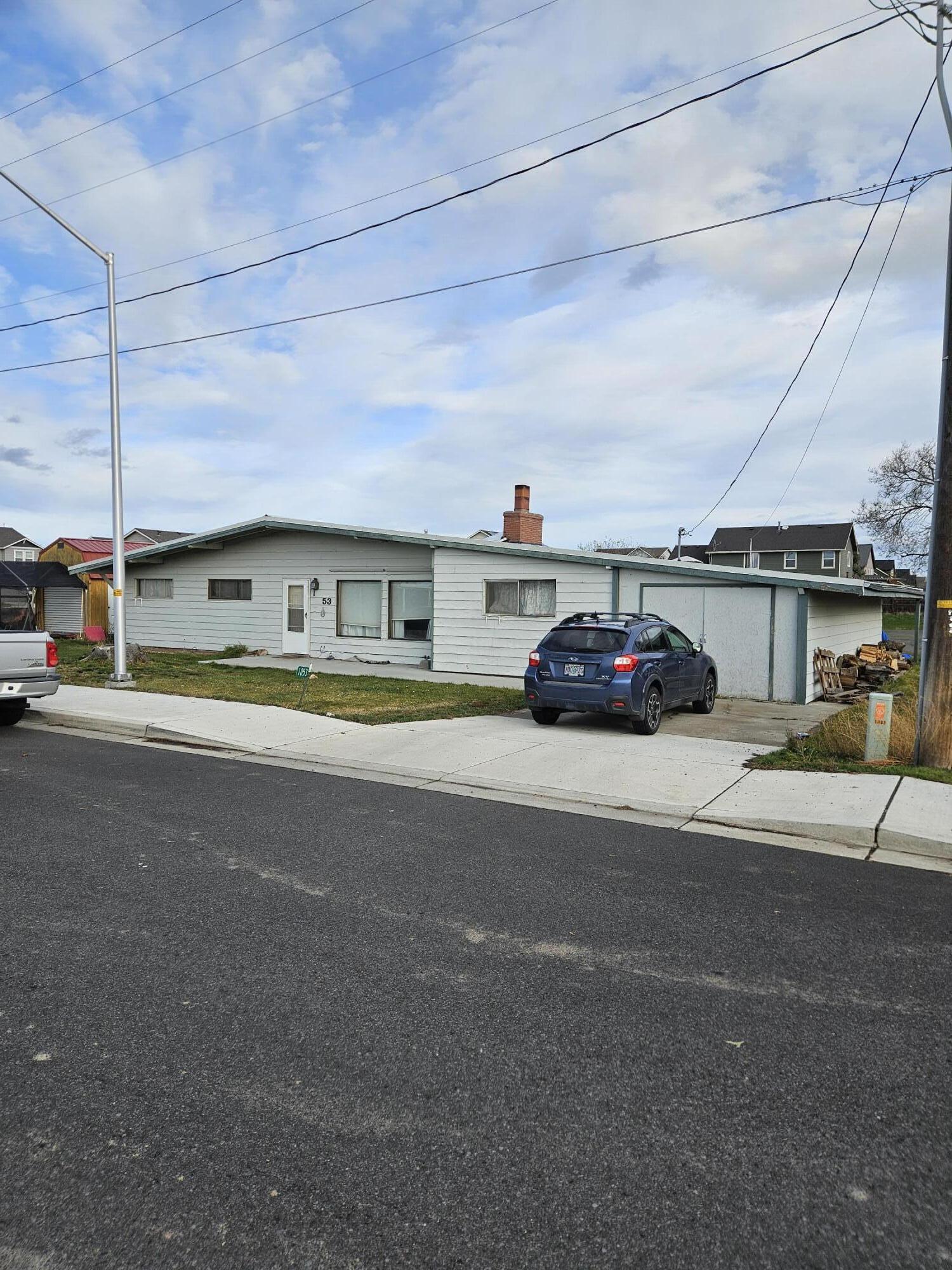 Nice spacious home in a great location.  Large lot with nice storage building.  Newer roof.  Nice woodstove for cozy winter days.