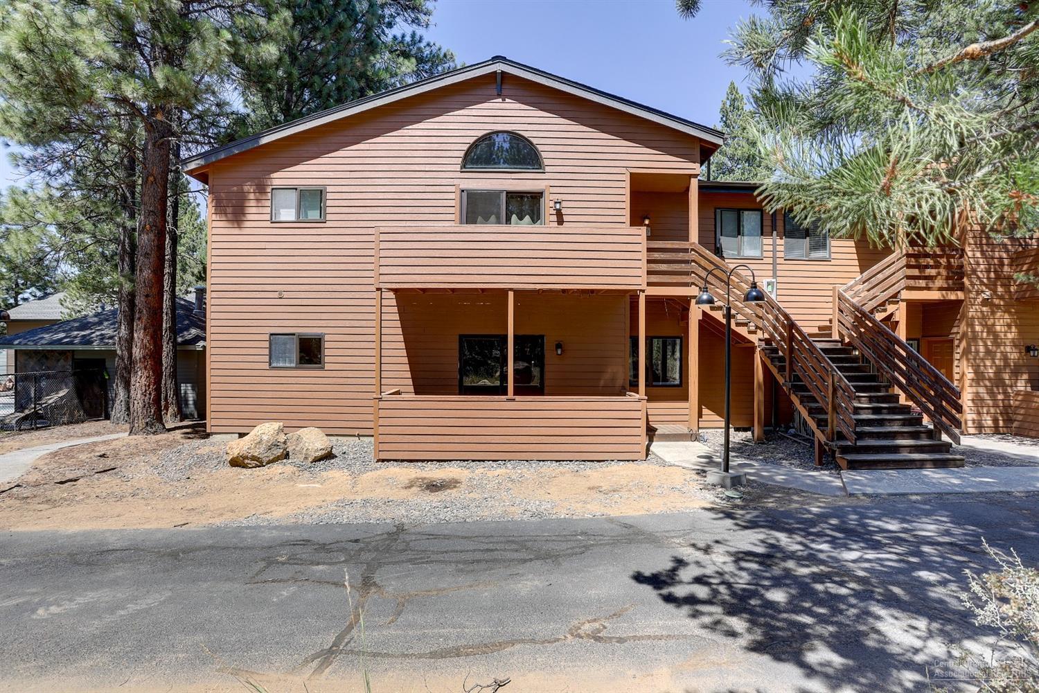 Enjoy living the Central Oregon Lifestyle in this light, open, lower-level Powder Village Condo with a view of the forest. You will feel at home in the open concept floor plan with 2 separated bedrooms and near the community pool/hot tub. Pride of ownership is apparent with the many upgrades including master bath, wood floors throughout, enhanced laundry space to allow for more counter space and wainscot accents. Come see your new get-away!