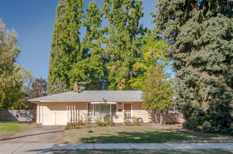 Cute home in a good neighborhood with a large fenced yard. This would make a great home for the first time Buyer or good investment property. Charming bathroom with original tile, there may be hardwood floors under new carpet, covered patio, huge back yard and it is close to a grade school, park, golf course, shopping and medical facilities. This one won't last long.