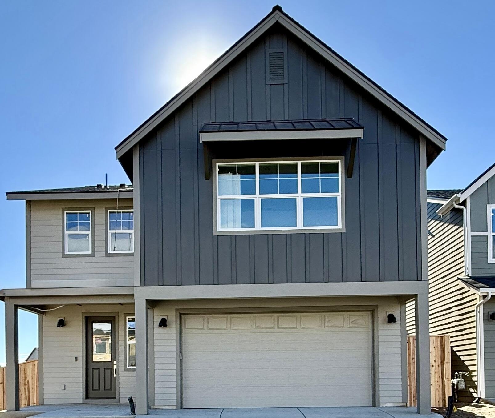 Welcome to Your Perfect Home in Stevens Ranch. This beautiful new home is the perfect fit for modern living. You'll fall in love with the quartz countertops, stainless steel appliances, and a thoughtfully designed layout that maximizes every inch of space.
The main level offers open-concept living, complete with a stunning floor-to-ceiling tiled fireplace and access to a covered patio—ideal for entertaining or relaxing year-round. Upstairs, you'll find three spacious bedrooms and a versatile bonus room. The luxurious primary suite features two walk-in closets, a large tiled shower, and dual vanities for ultimate comfort. This Earth Advantage-certified home includes a fully landscaped front and back yard, fencing, air conditioning, and a 220-volt plug for your electric vehicle. Stevens Ranch offers more than just a home; it's a lifestyle. Enjoy community parks, walking paths, fascinating lava cave.