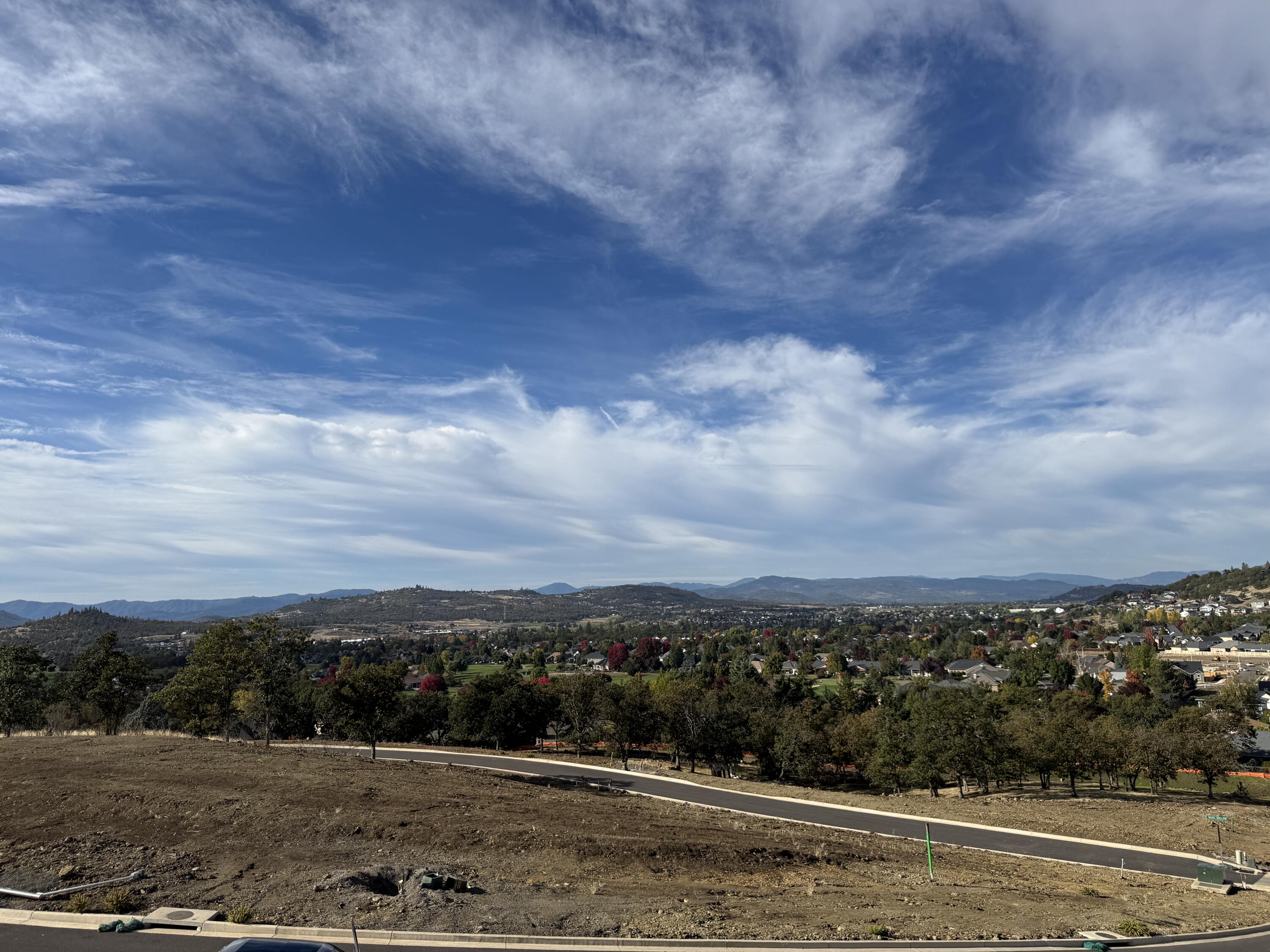 Introducing Quail Run Estates, Eagle Point's premier new subdivision of large luxury estate lots. Discover a rare opportunity to build your dream estate on one of these generous 1-acre view lots, perfectly situated overlooking the renowned Eagle Point Golf Community. These elevated home sites boast breathtaking, panoramic views of the golf course, surrounding mountains, and Rogue Valley. LOT 89