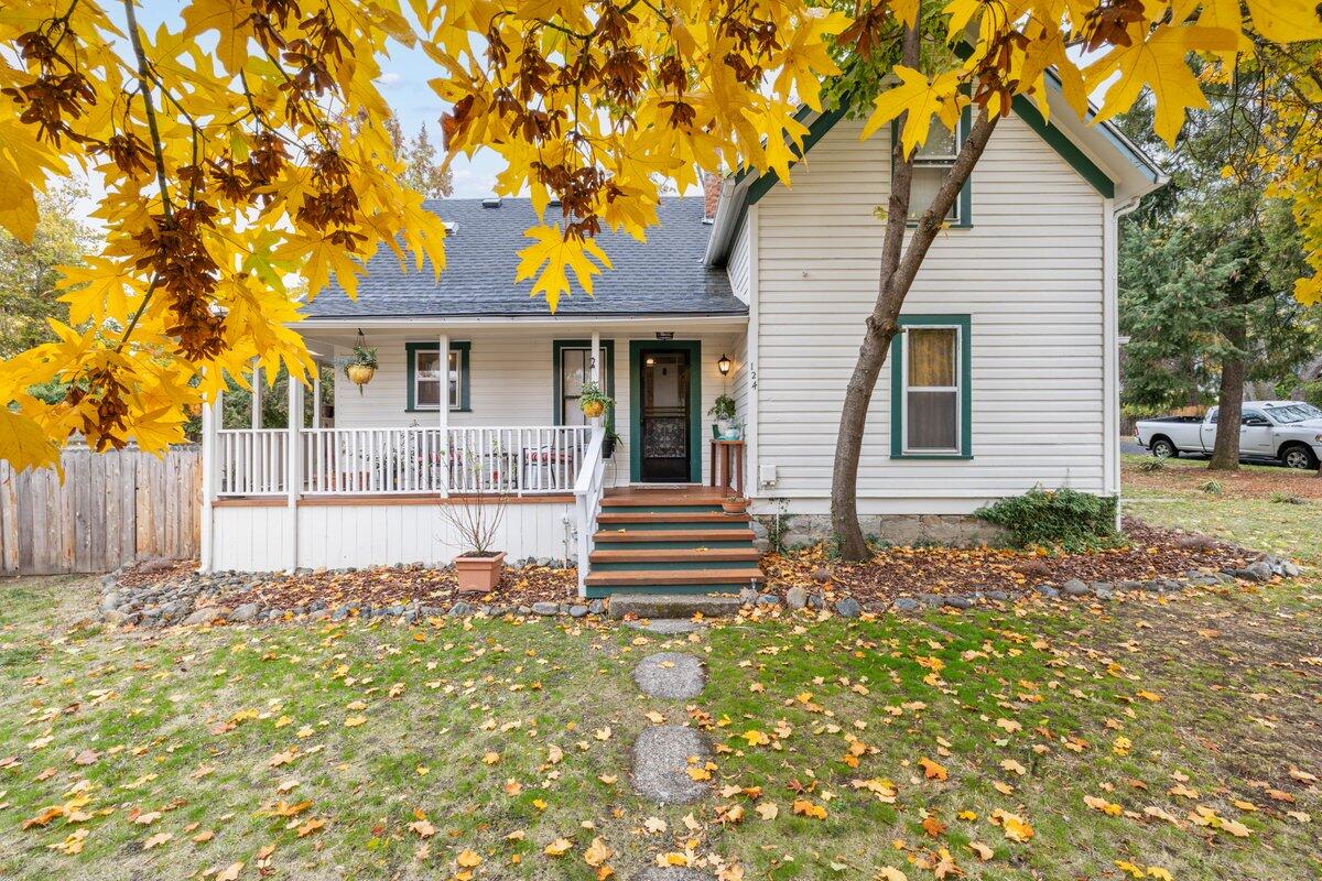 Discover timeless charm in this historic and fully furnished two-unit farmhouse, completed in 1900 on a spacious, large corner lot in a sought-after neighborhood near downtown and The Shakespeare Festival. The first-floor unit offers a wraparound porch, south-facing deck, and a large backyard with built-in gas fire pits. Inside, enjoy an open kitchen/living area, vaulted stamped ceilings, custom hardwood floors, two bedrooms (one with a fireplace), a large bath with dual vanities, and a clawfoot
tub. The upstairs unit includes two bedrooms, a full bath, separate entry, and custom wood floors. Zoned R-2, it's ideal as an income property, single-family home conversion, or live/rent setup;
Vacation rental permits available through city, ADU permissible, detached garage has potential for ADU conversion, possible lot split (buyer to verify with city). Endless possibilities await!