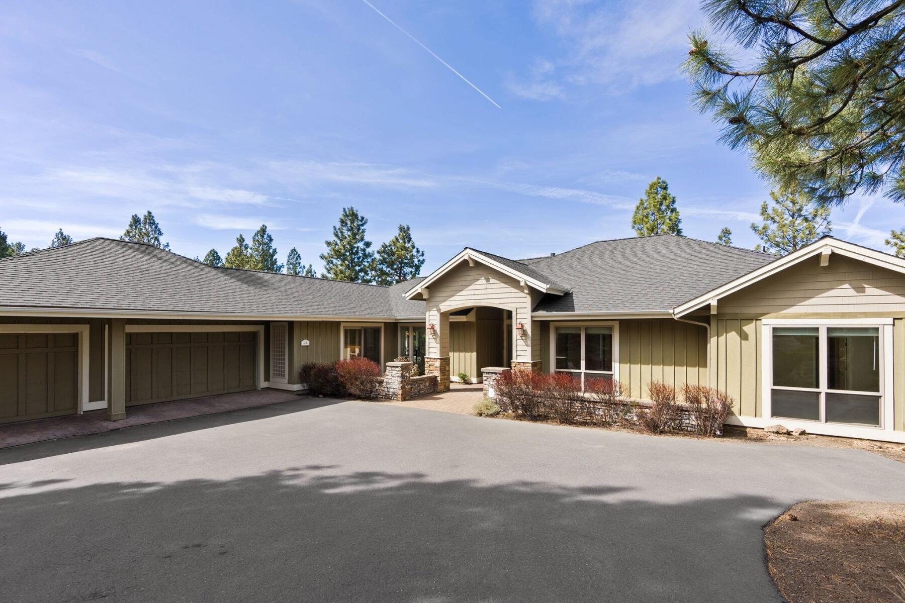 This stunning SINGLE LEVEL Awbrey Butte home is situated on a large .77-acre lot with a 3-car garage & Cascade Mountain views. Enter into the main living area where soaring 12' ceilings & an updated stacked stone gas fireplace create an inviting atmosphere. A wall of windows brings light & the beauty of the outdoors inside. The hardwood floors flow into the dining room, breakfast nook & chef's kitchen. A kitchen designed for both function & style boasting granite countertops, a Bosch dishwasher, a Viking 6-burner cooktop, a Viking double oven & ample storage. Down the hall, you'll find a versatile office/  4th bedroom, two additional bedrooms with a Jack-&-Jill bathroom, plus 1 of 2 half baths. The primary suite is a true retreat, featuring a spacious en-suite with dual sinks, a soaking tub, tiled shower, & a walk-in closet. Step outside onto the expansive paver deck, where you can relax in the peaceful setting. All just minutes from downtown Bend & endless outdoor adventures.