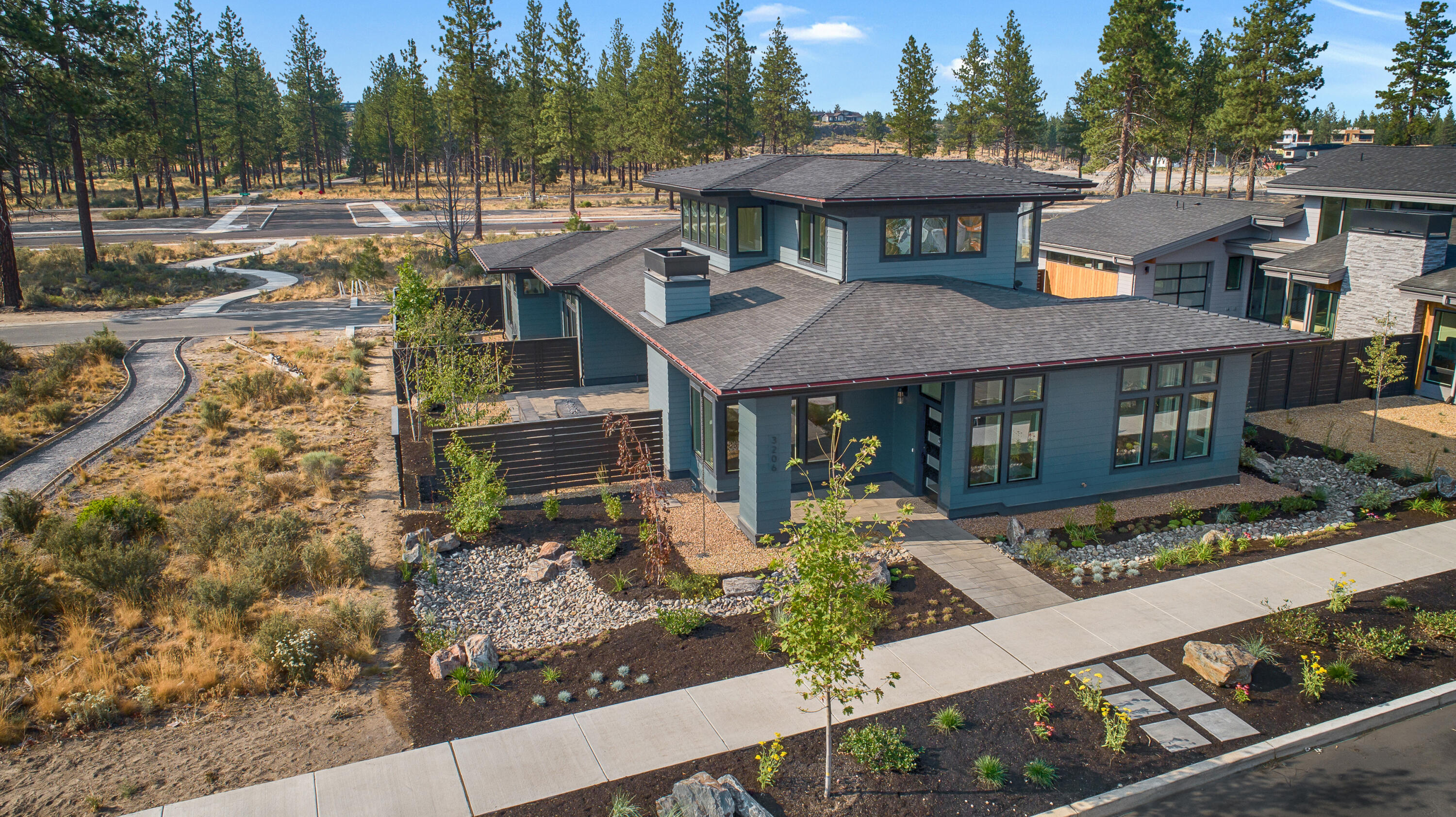 Exquisite Frank Lloyd Wright inspired home in one of Bend's newest neighborhoods, Discovery West. Corner lot adjacent to open space, near the center of Discovery West and connector trails to Discovery Park. Entry foyer leads to an open great room with 10' ceilings, dining area and generous kitchen. Kitchen features custom cabinetry, slab quartz counters, premier appliance package and large pantry. Resident bedroom suite on the main floor with radiant floor heat in the bathroom, tiled shower, soaking tub & walk-in closet. Main level office for the perfect work from home professional space along with additional storage. Upstairs includes two additional guest bedrooms, guest bathroom and generous flex/bonus space. Massive two car garage with storage for all the requisite Central Oregon toys. Discovery West, situated on 245 acres on Bend's westside, is the newest community by the developers behind the award-winning NorthWest Crossing neighborhood.