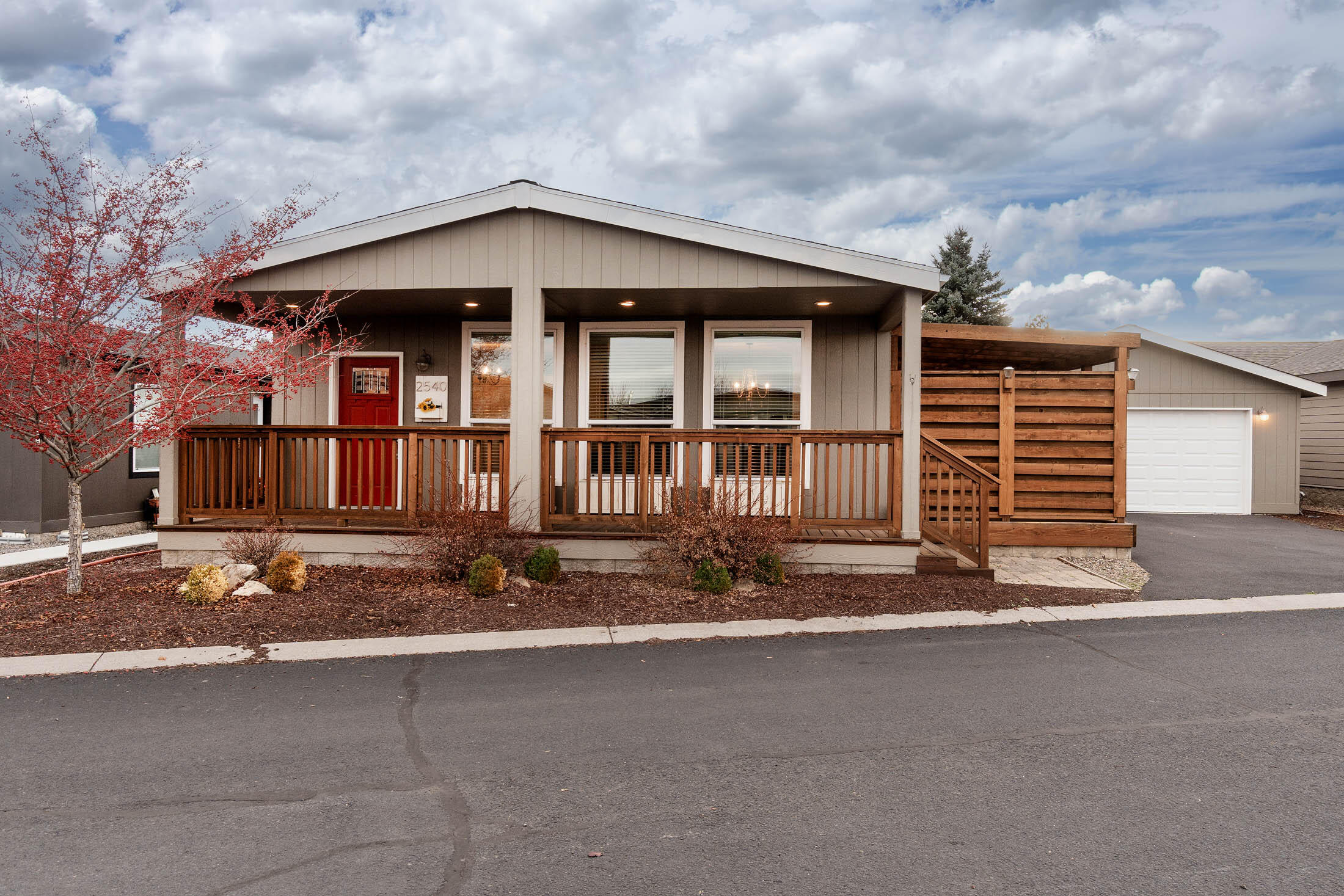 Charming Home in Aspen Creek with Unique movable Accent Walls to define your space. Beautiful Bamboo 
flooring throughout the home, Tiled accents in Kitchen and Bathrooms, Custom Furnishings included! Double Doors that lead to a Private Oasis, with several Outdoor Living Areas 
and a Gas Firepit. But wait there is more, Double Car Garage and a Flex Space - You can use it as a work 
area or Gym. The Clubhouse is Amazing too! Call Your Favorite Realtor Today! This home is a must see!