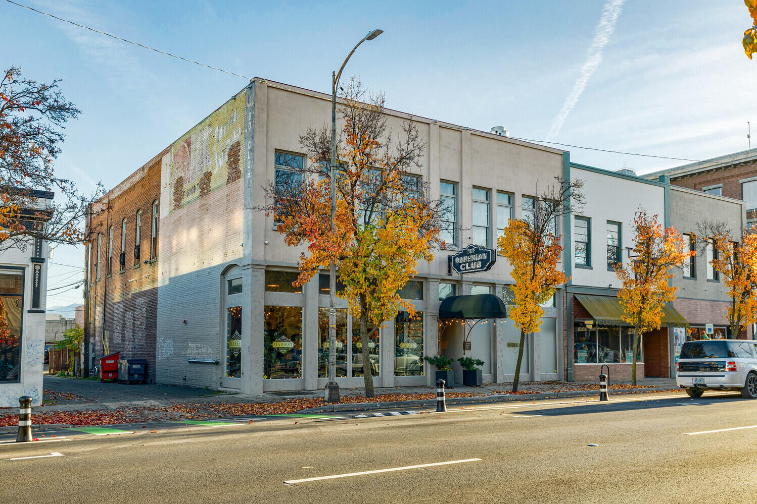 Long established updated downtown building in the heart of Medford. The icon Bohemian Club building is a retro fitted restored vintage building. The uses could be many. It is 2 stories with 2 stairwells. Currently a bustling restaurant with a full-size kitchen with 6 wolf burner oven /range,1-2 bin gas steam table, wolf salamander,1-4 burner wolf range, dishwasher, refrigerator, and  list of bar equipment. Bar, and storage Event upstairs for small events. Outdoor patio with pollinator gardens.
This could be apartments upstairs and 2 restaurants below.  Or 4 restaurants in 1 big building.